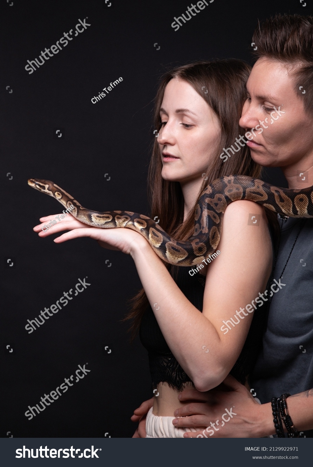 Photo Two Hugging Women Python On Stock Photo 2129922971 | Shutterstock