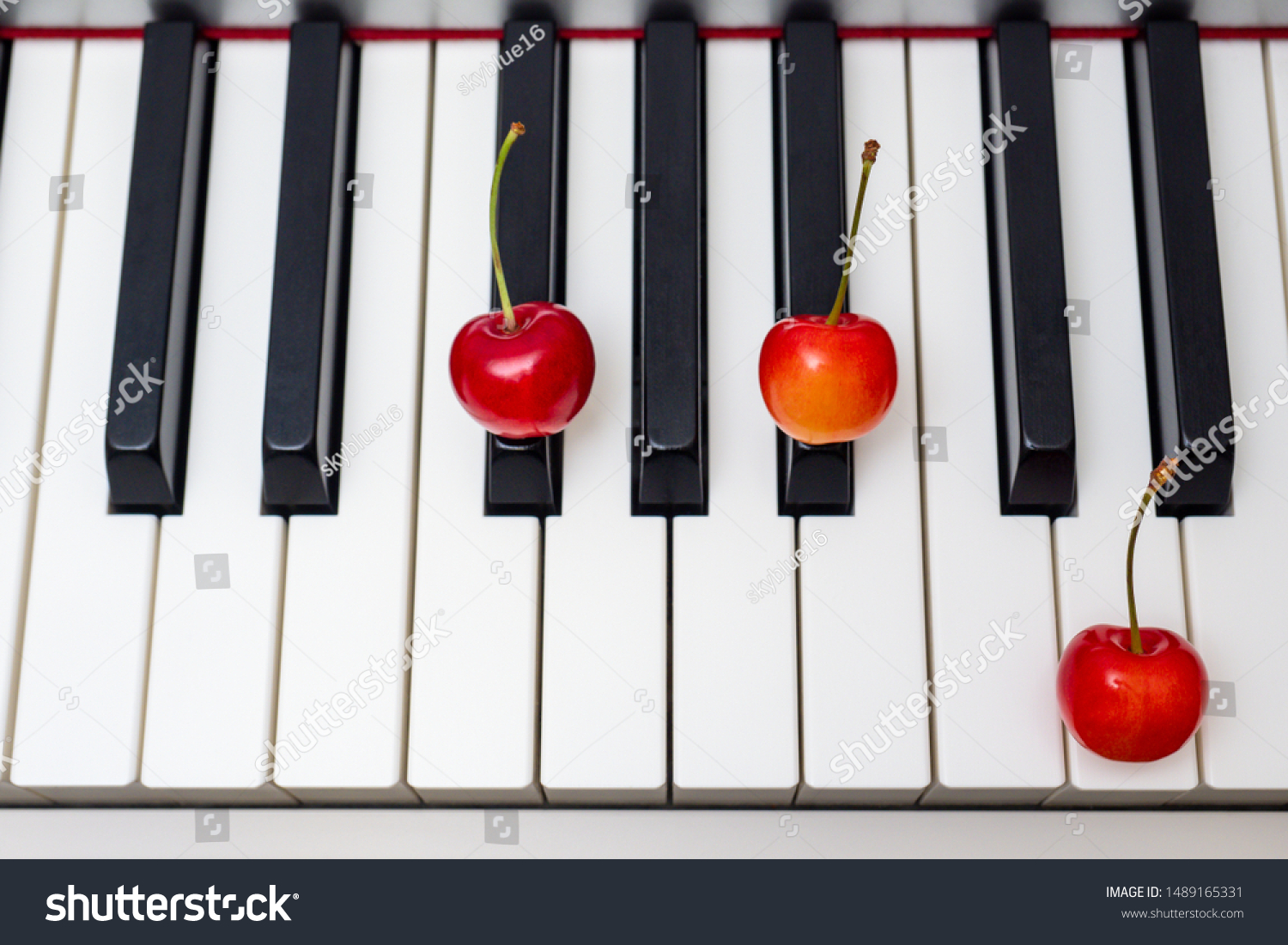 Piano Chord Shown By Cherries Augmented Stock Photo Edit Now