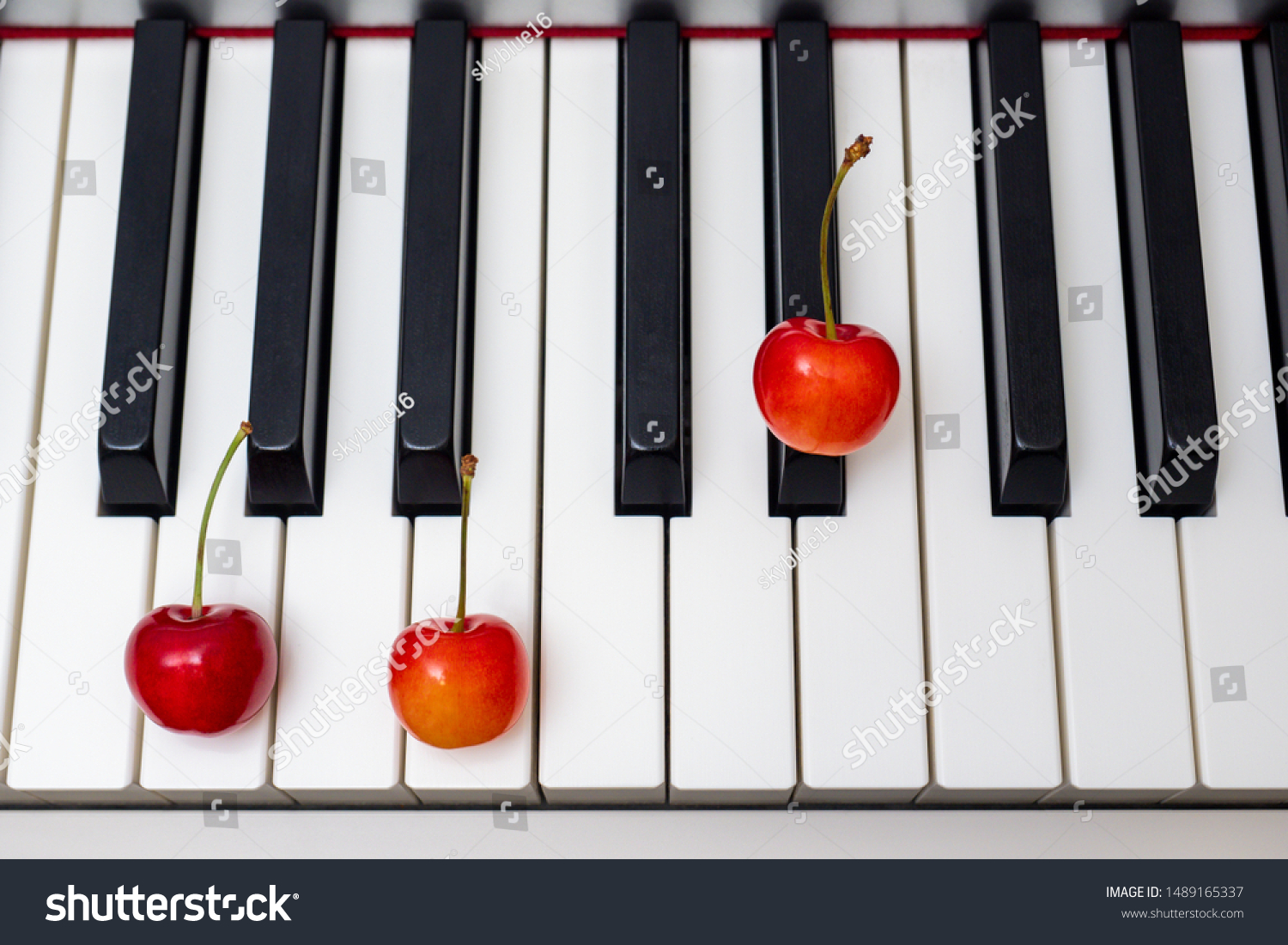 Piano Chord Shown By Cherries On Stock Photo Edit Now