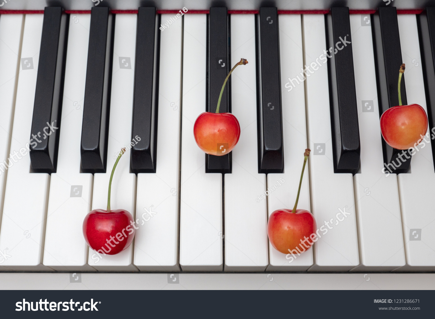 Piano Chord Shown By Cherries On Stock Photo Edit Now 1231286671