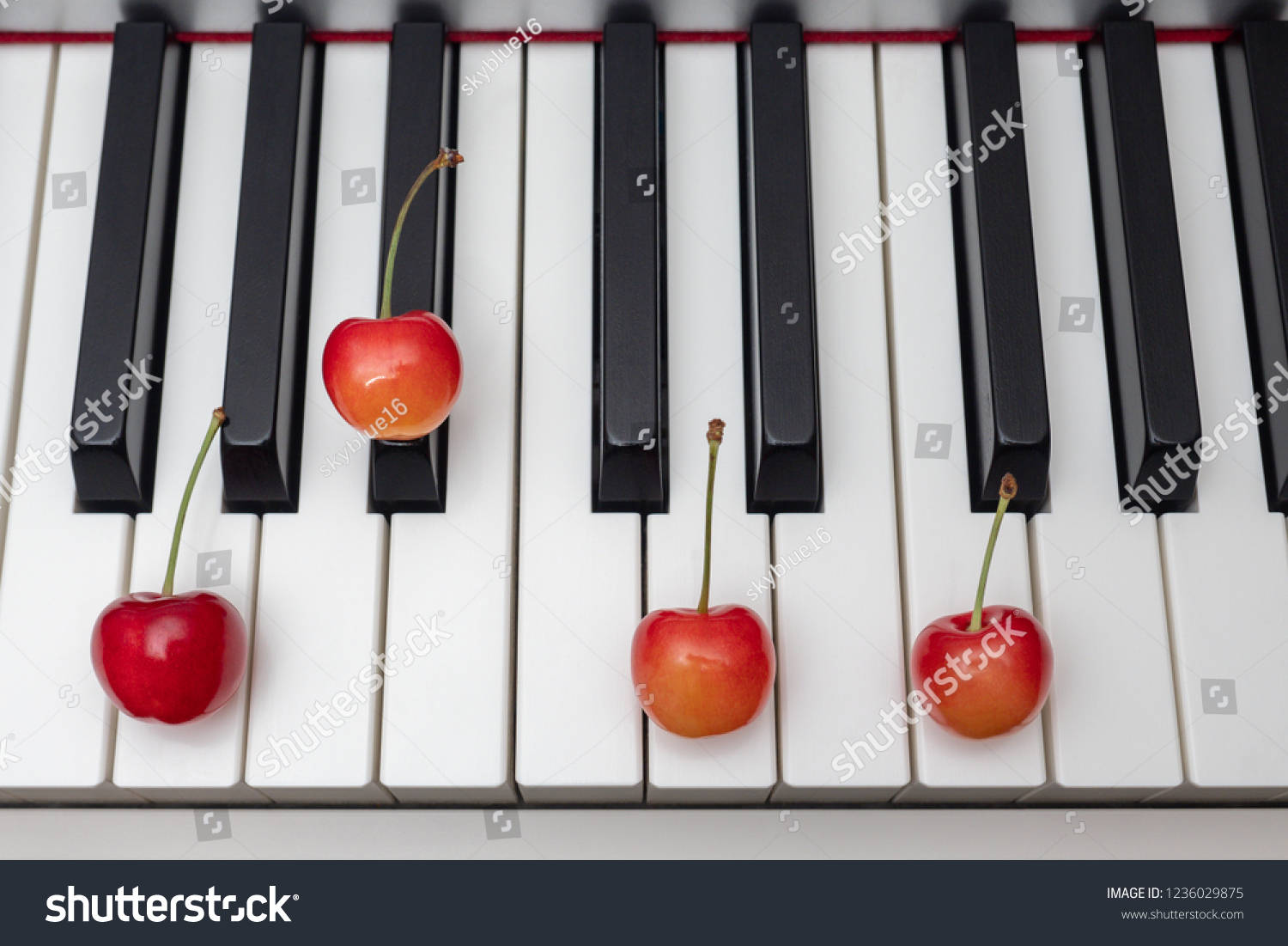 Piano Chord Shown By Cherries On Stock Photo Edit Now 1236029875