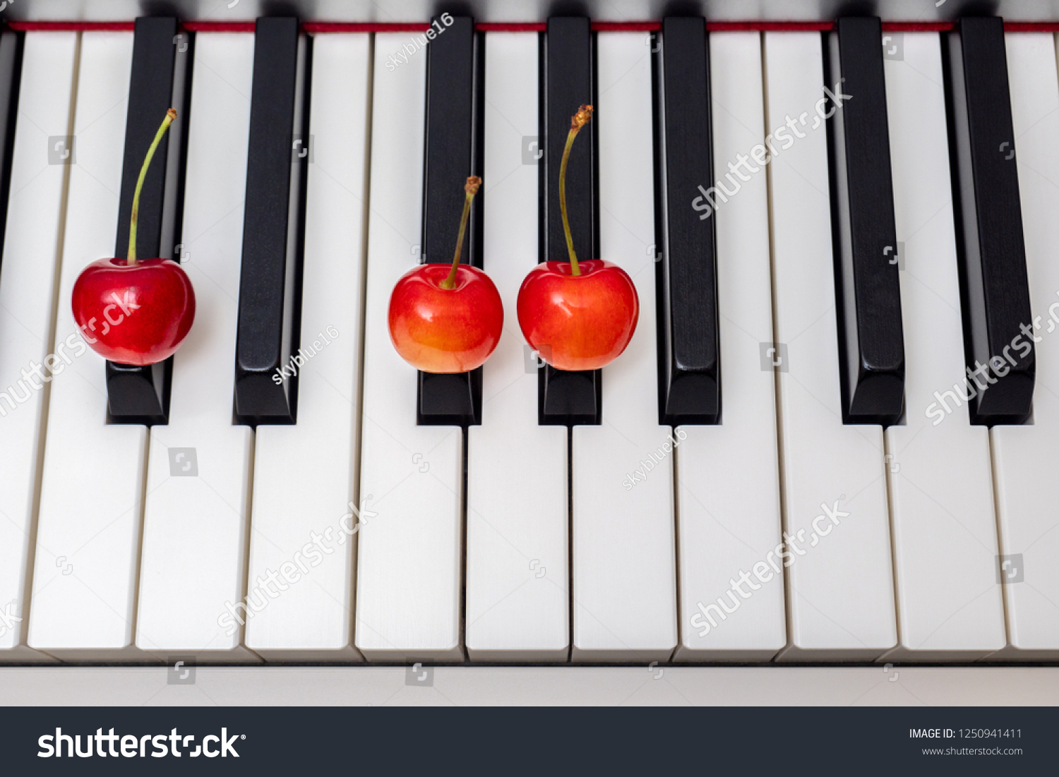 Piano Chord Shown By Cherries On Stock Photo Edit Now