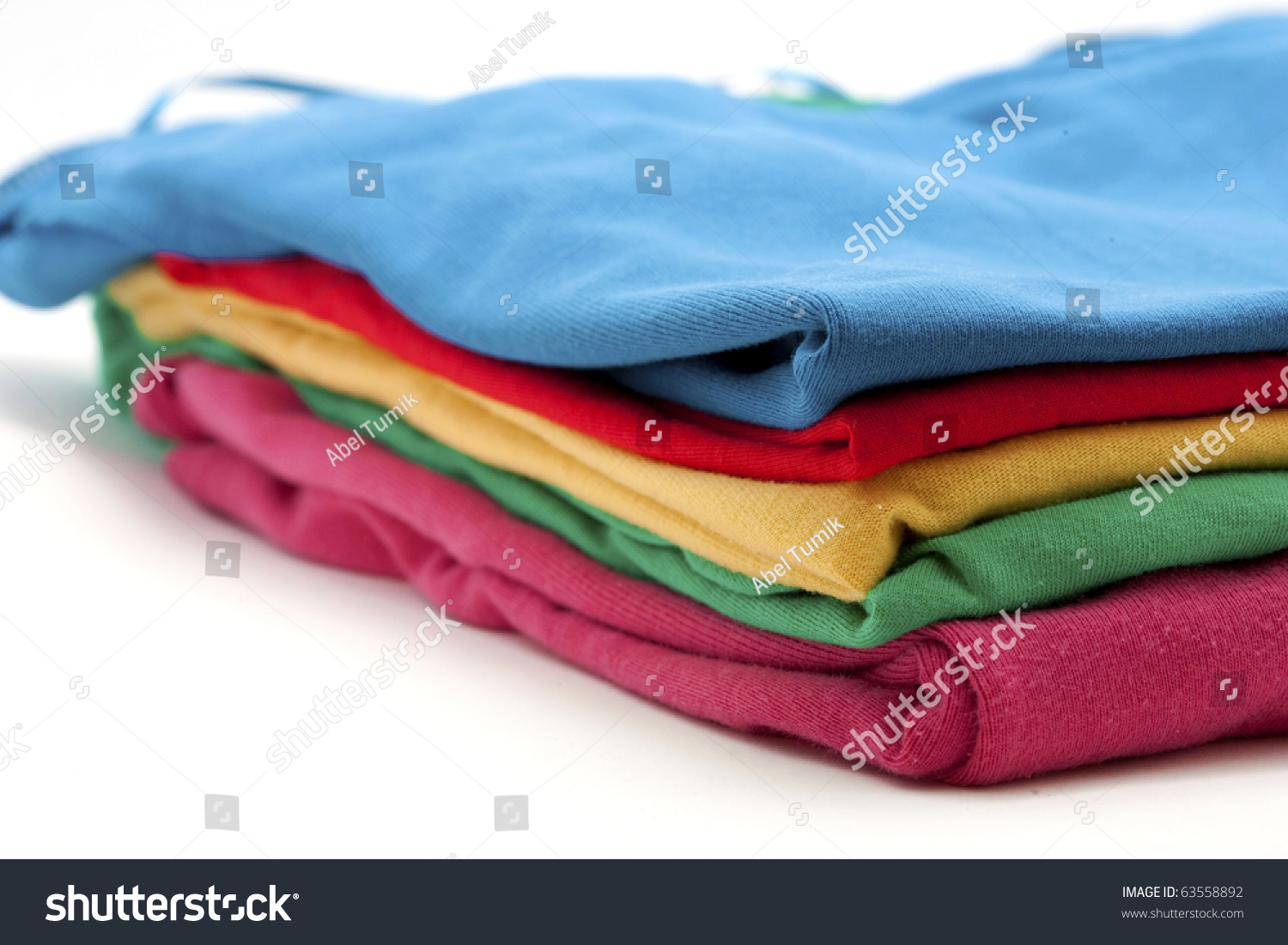 Pile Of Colorful T-Shirts Isolated On White Stock Photo 63558892 ...