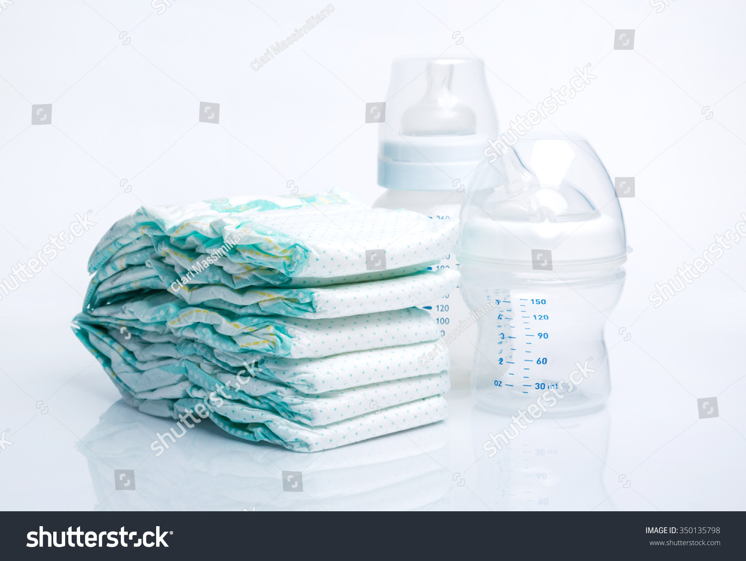 Pile Diapers Baby Bottles Isolated On Stock Photo 350135798 - Shutterstock