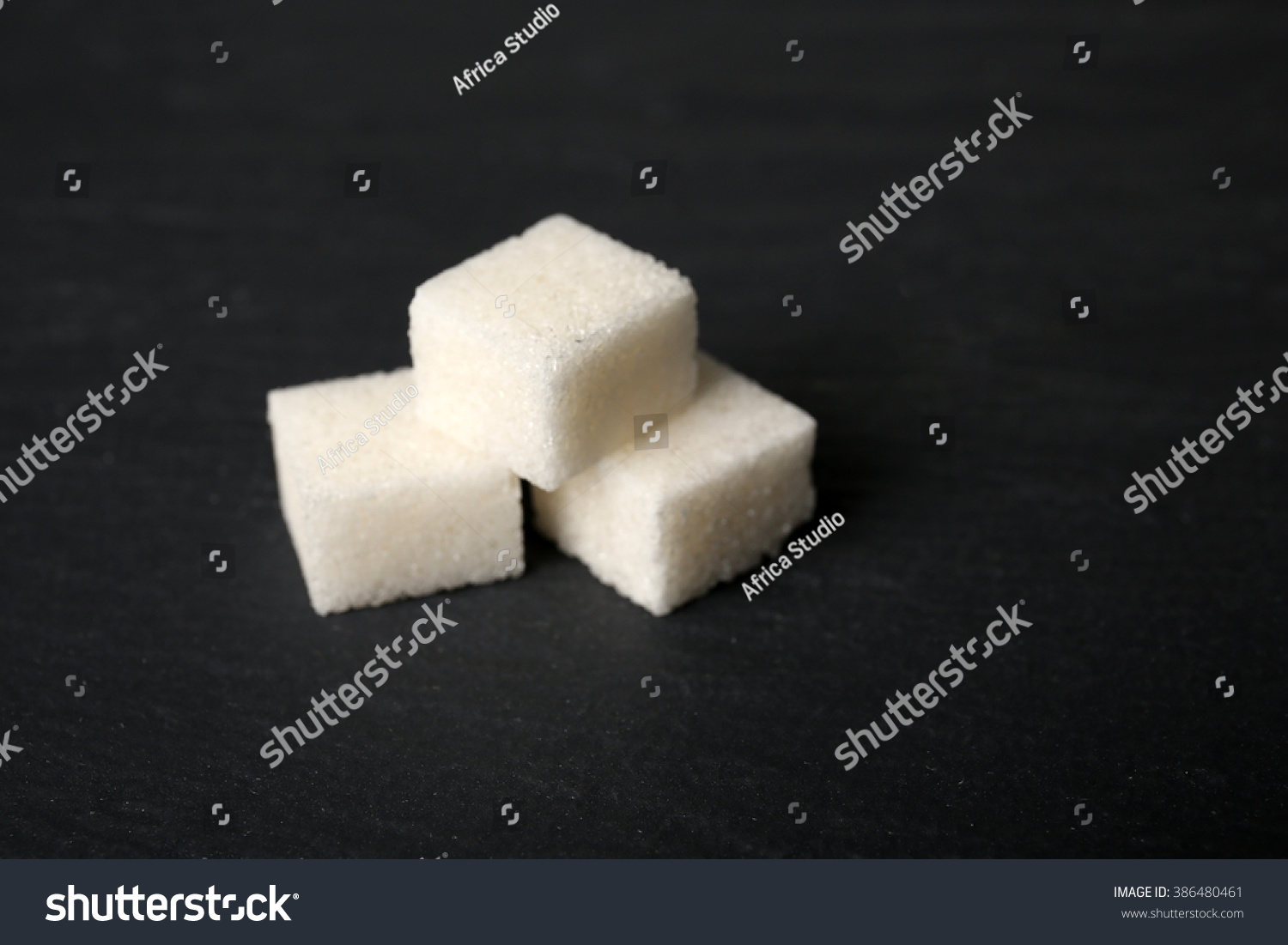 Pile Of Sugar Cubes On The Table Stock Photo 386480461 : Shutterstock