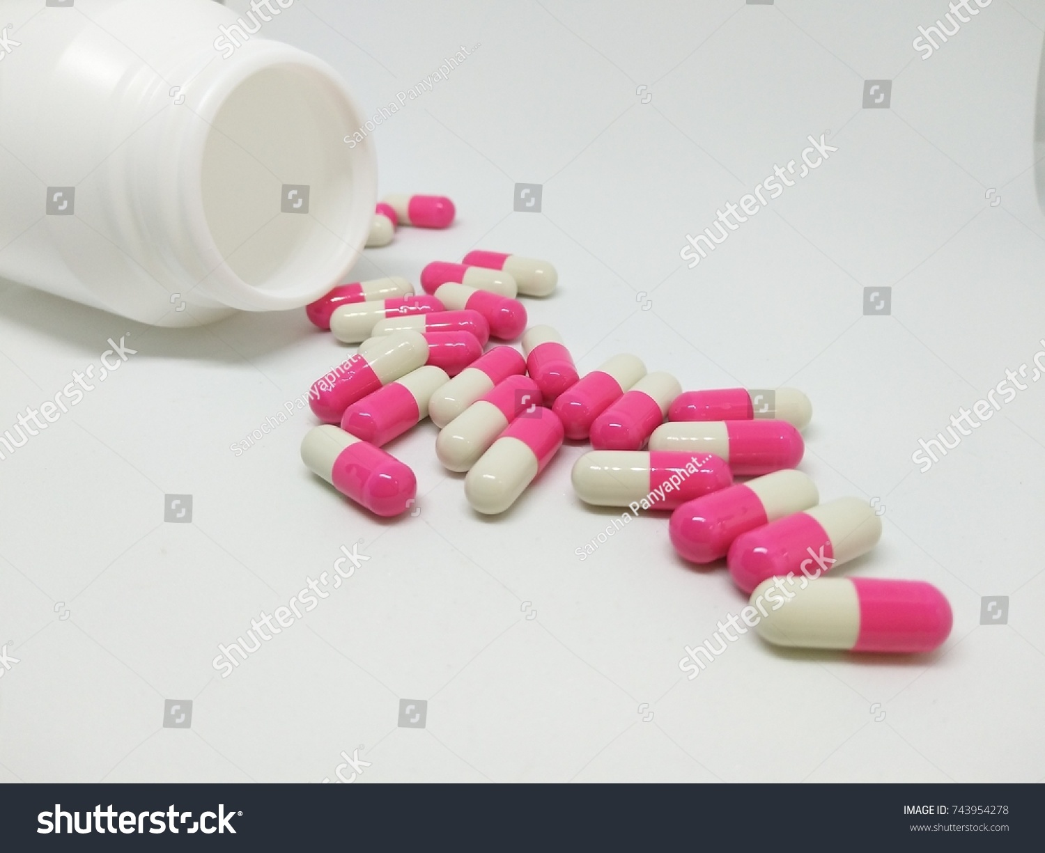 Pink White Capsul On White Background Stock Photo Edit Now