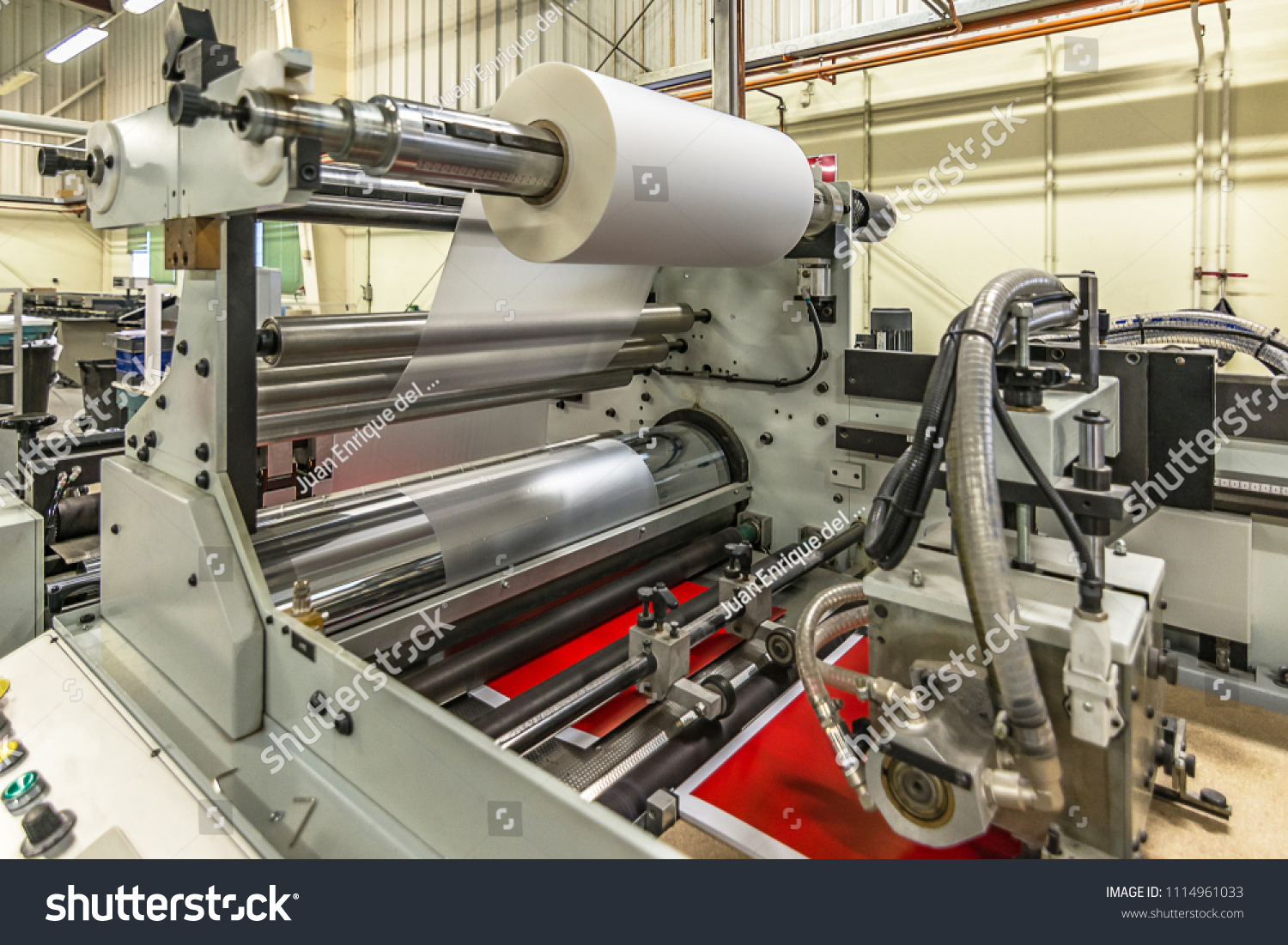 Plastic Laminating Machine Stock Photo (Edit Now) 1114961033