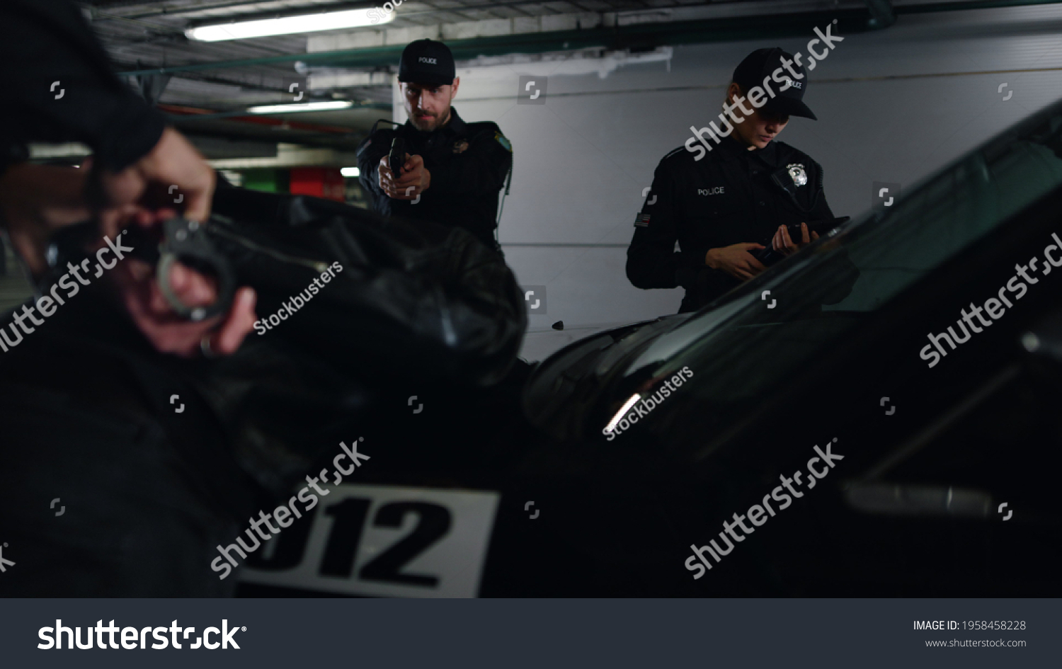 Police Team Arresting Criminal Underground Parking Stock Photo ...