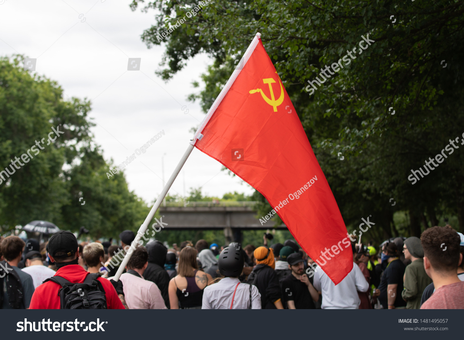 stock-photo-portland-or-usa-august-antifa-protest-red-soviet-era-communist-flag-with-star-1481495057.jpg