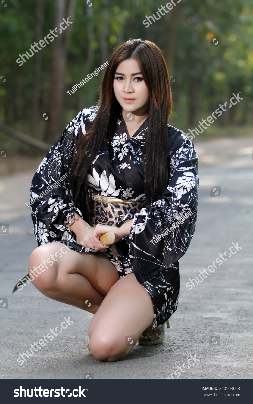 https://image.shutterstock.com/z/stock-photo-portrait-asia-beautiful-japanese-kimono-woman-and-japanese-geisha-woman-with-japanese-sword-and-240503608.jpg
