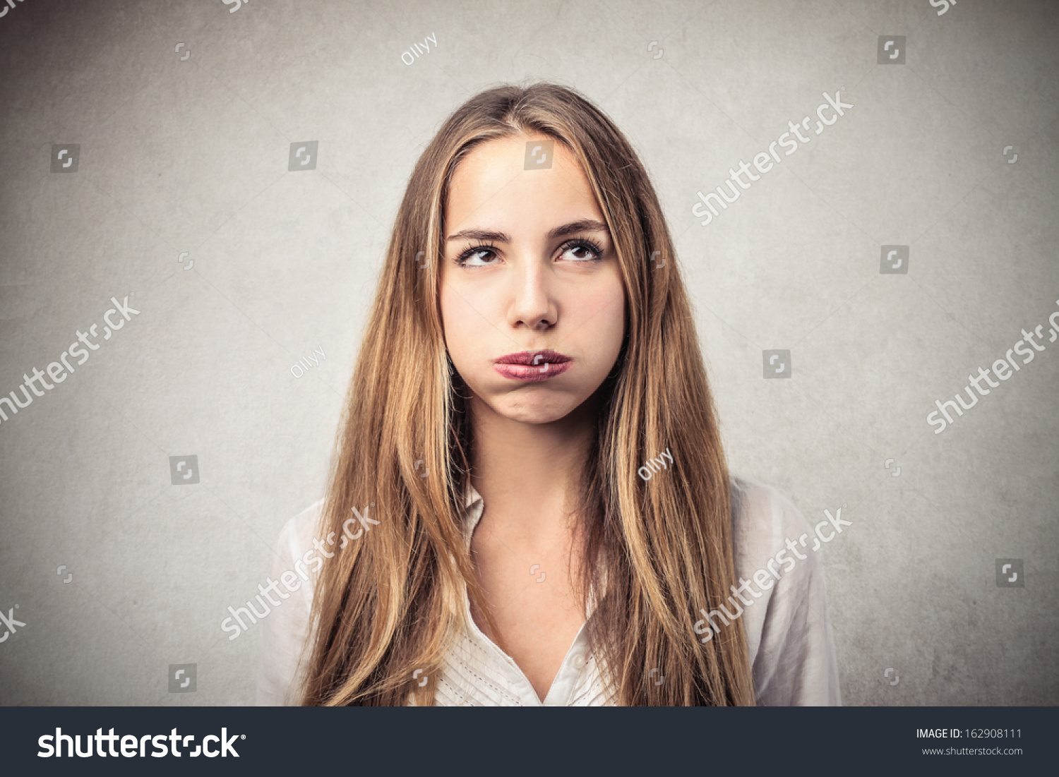 Portrait Of A Bored Woman Stock Photo 162908111 : Shutterstock