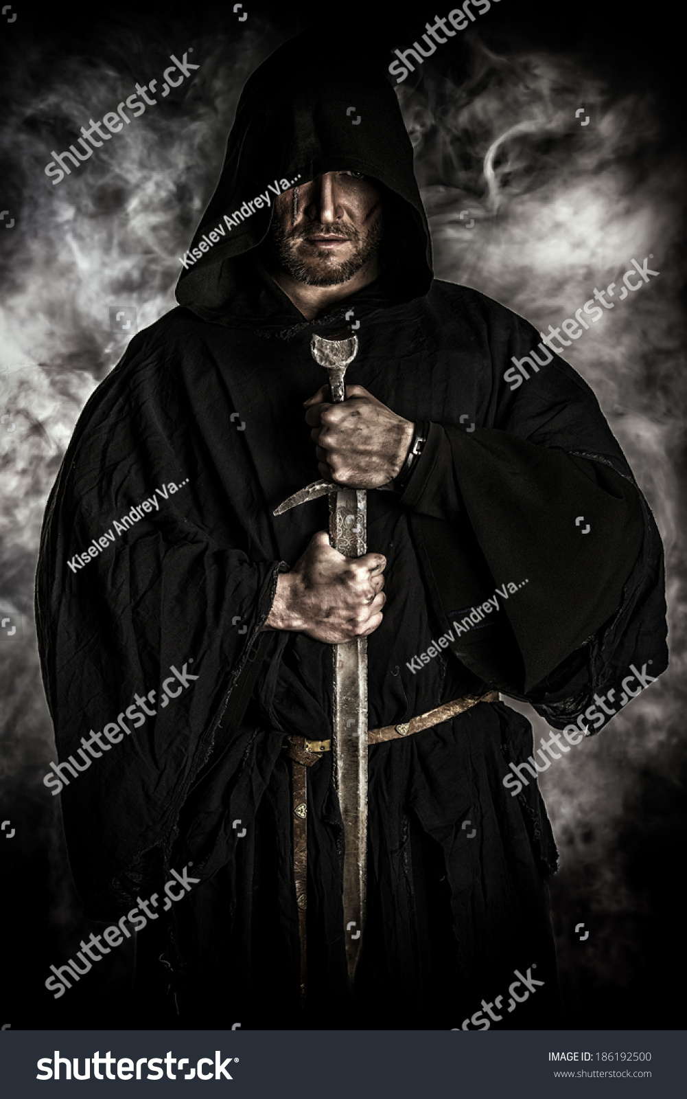 Portrait Of A Courageous Warrior Wanderer In A Black Cloak And Sword In ...