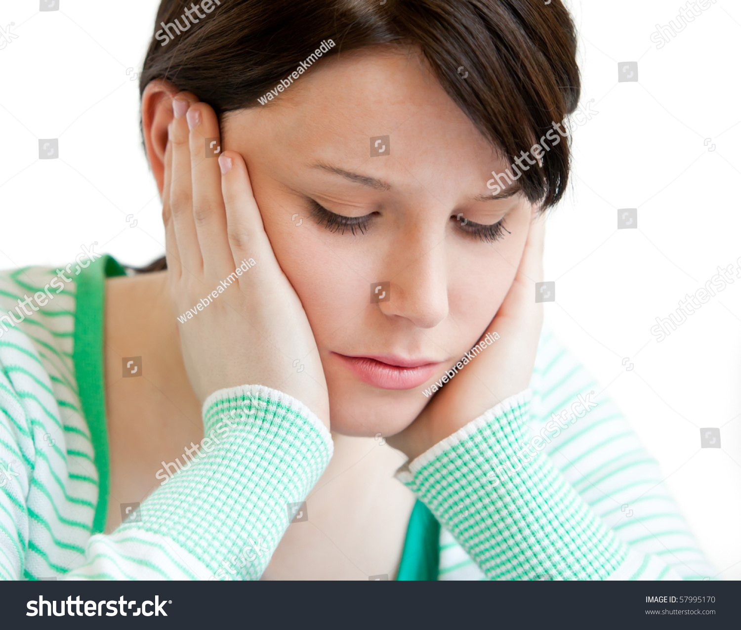 Portrait Of A Depressed Teenager Holding Up Her Head On Her Hands ...