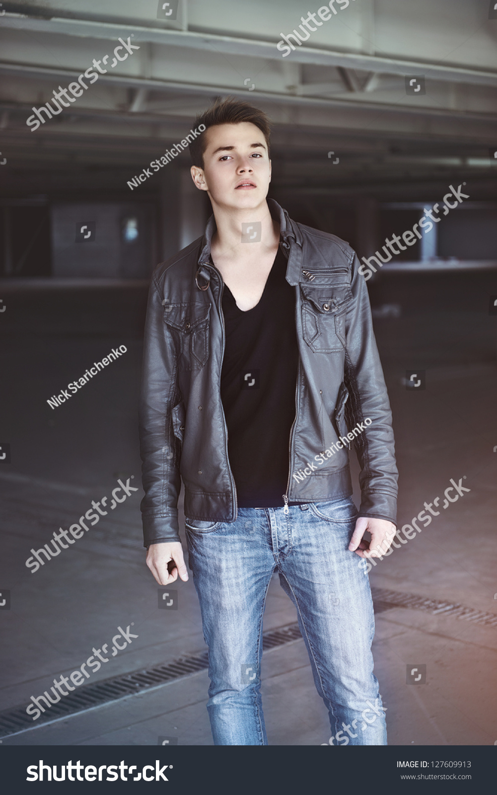 Portrait Of A Fashionable Man Walking In Coat And Jeans Wear. Urban ...