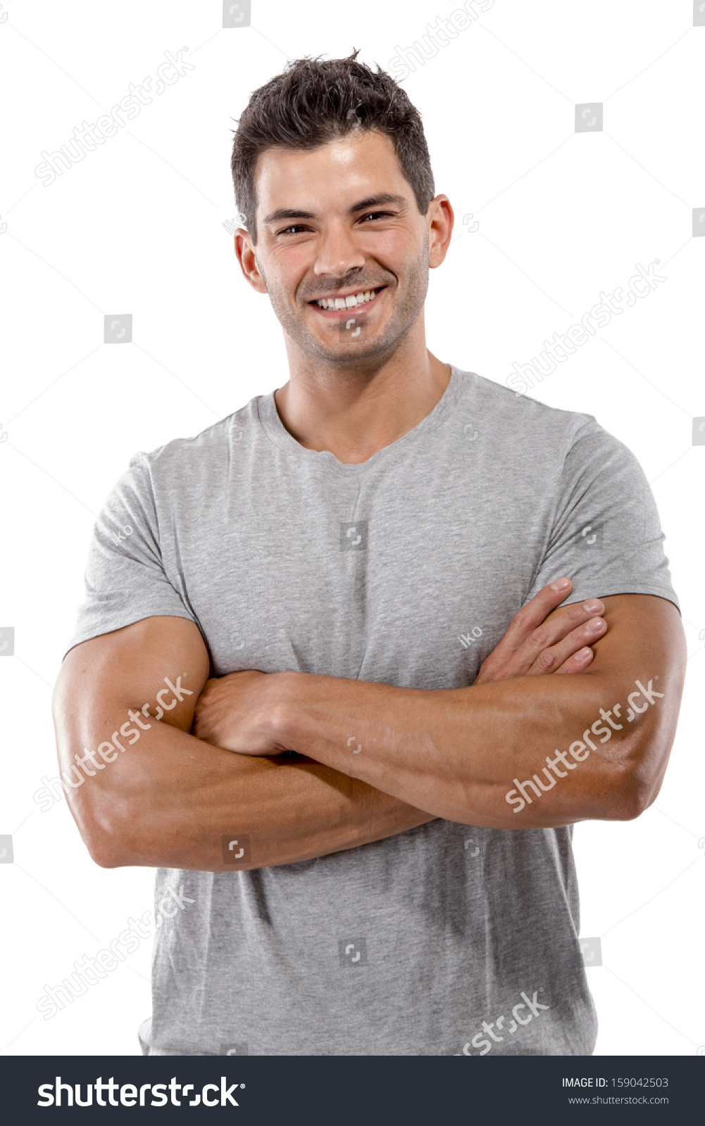 Portrait Of A Handsome Latin Man Smiling With Hands Folded, Isolated ...