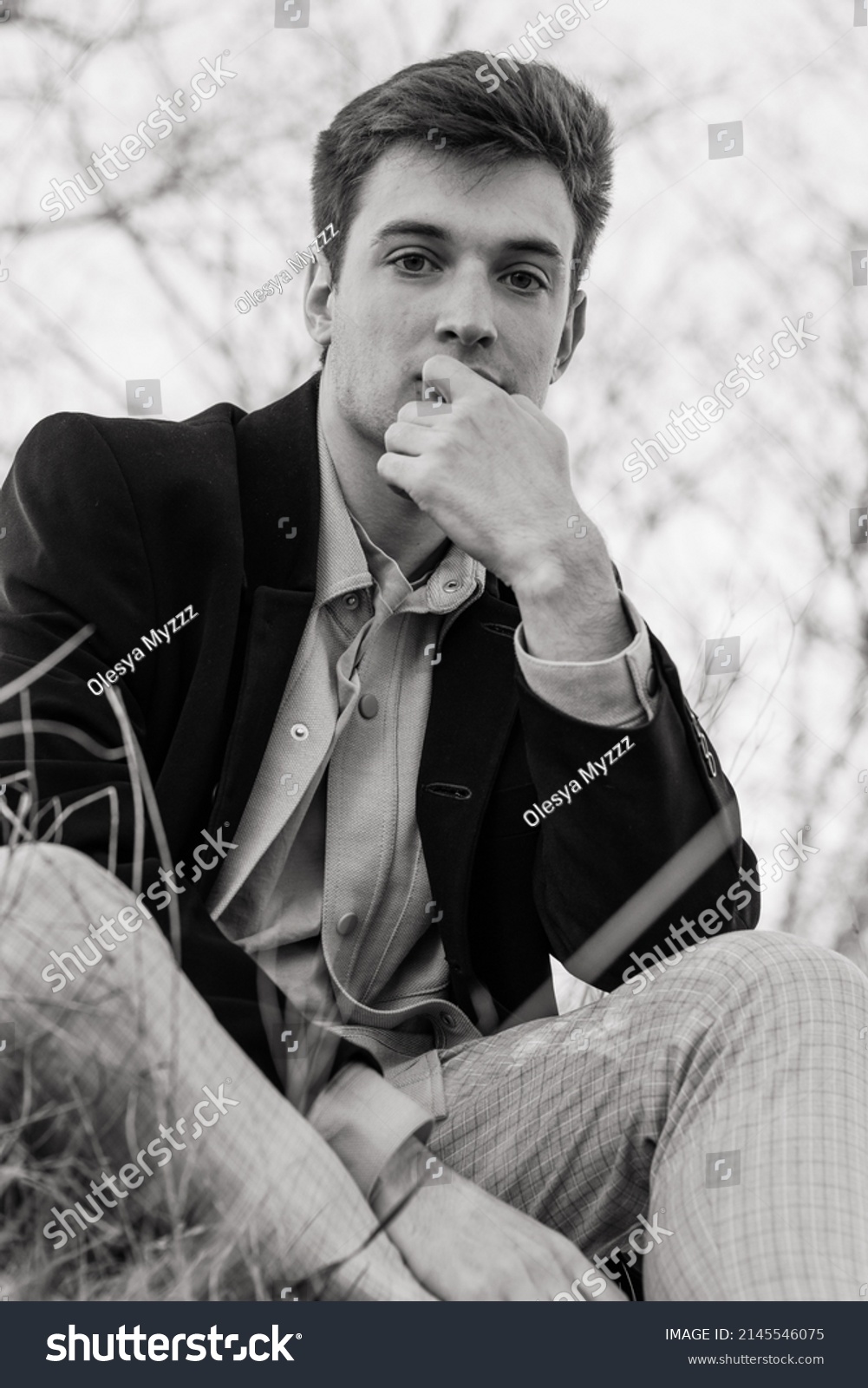 portrait-handsome-young-man-nature-black-stock-photo-2145546075-shutterstock