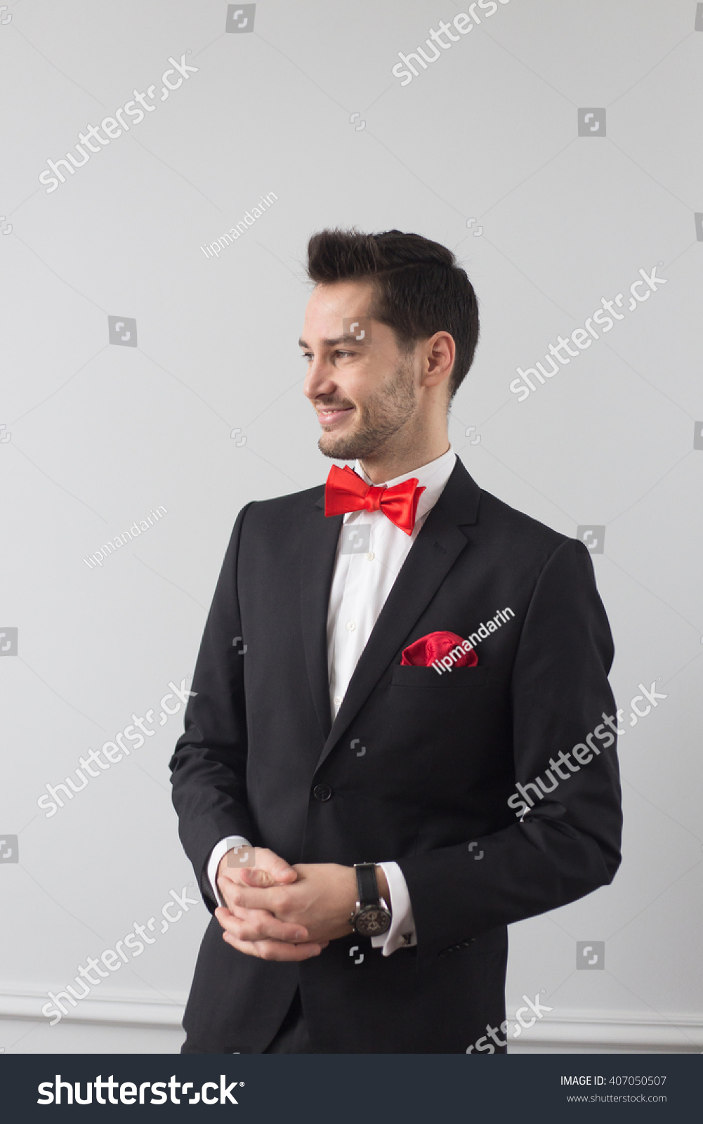 black suit red handkerchief