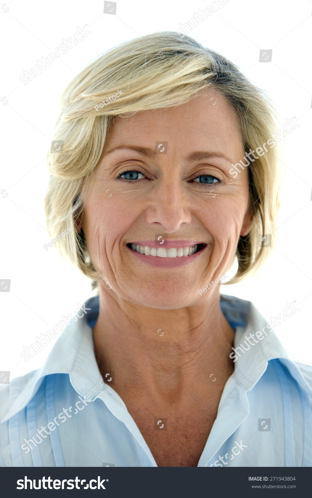 Portrait Of A Smiling Mature Woman Over White Background Stock Photo ...