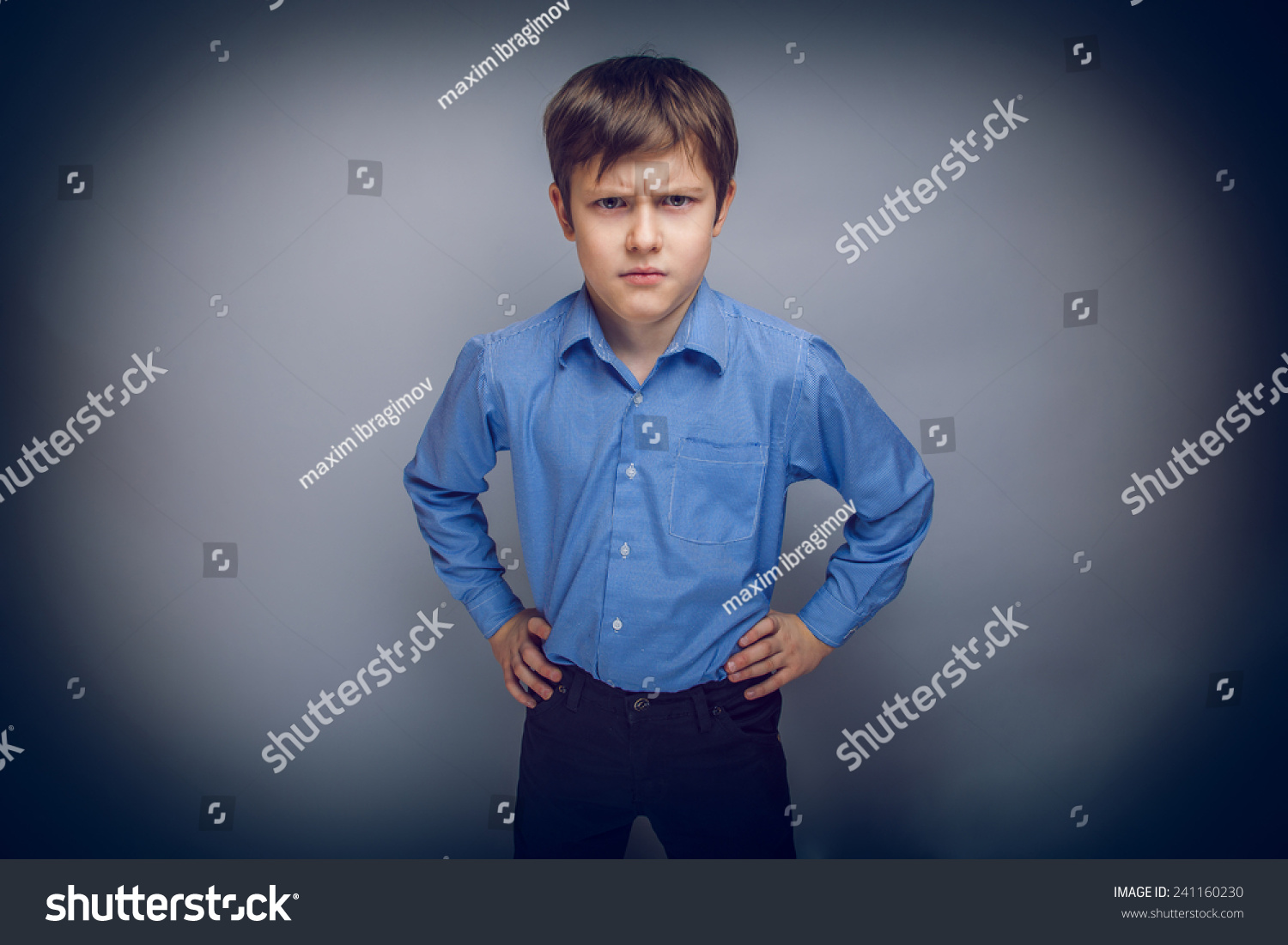 Portrait Of A Teenage Boy Frowning Brown Hair Of European Appearance On ...