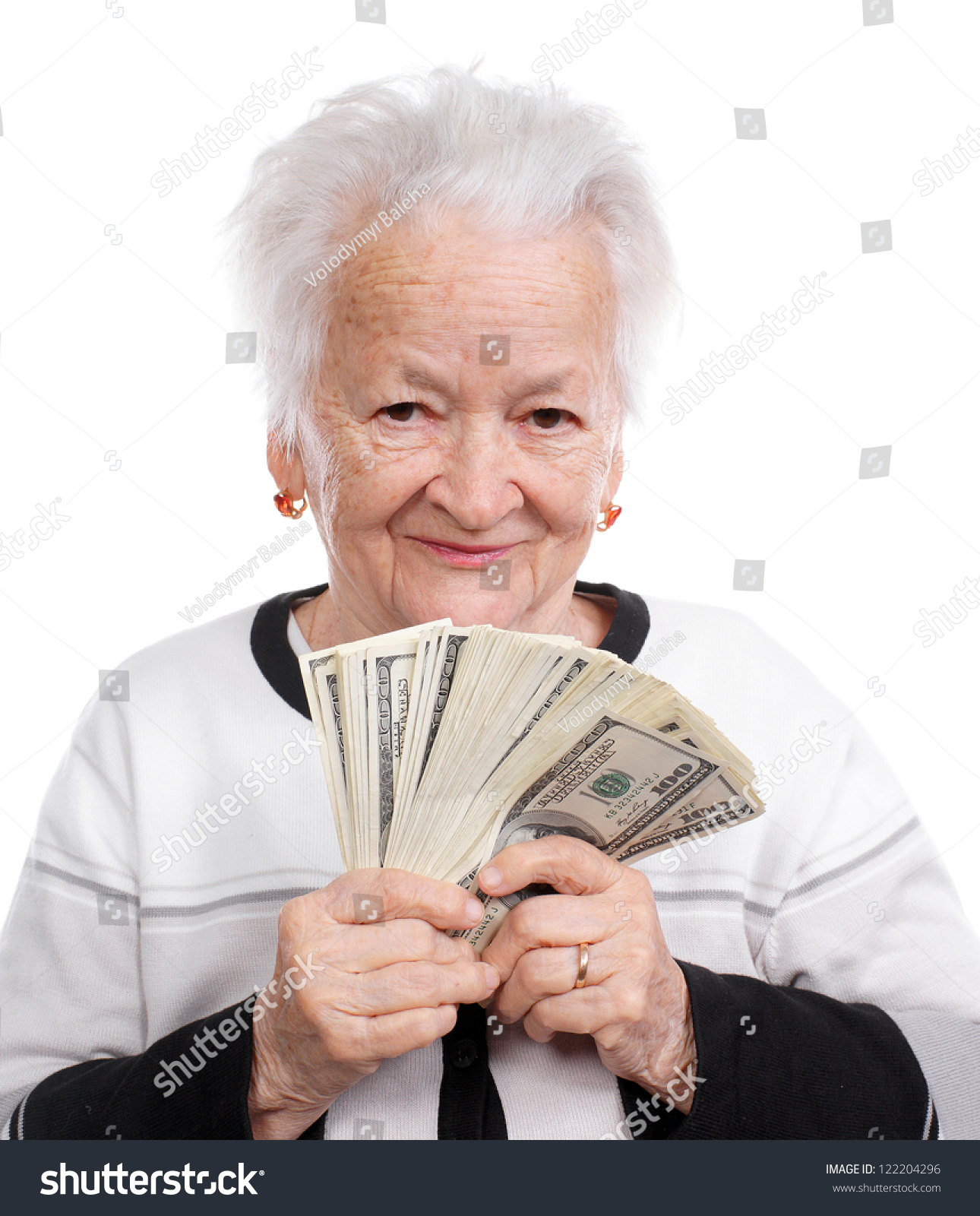 Portrait Of An Old Woman Holding Money In Hand On White Background ...