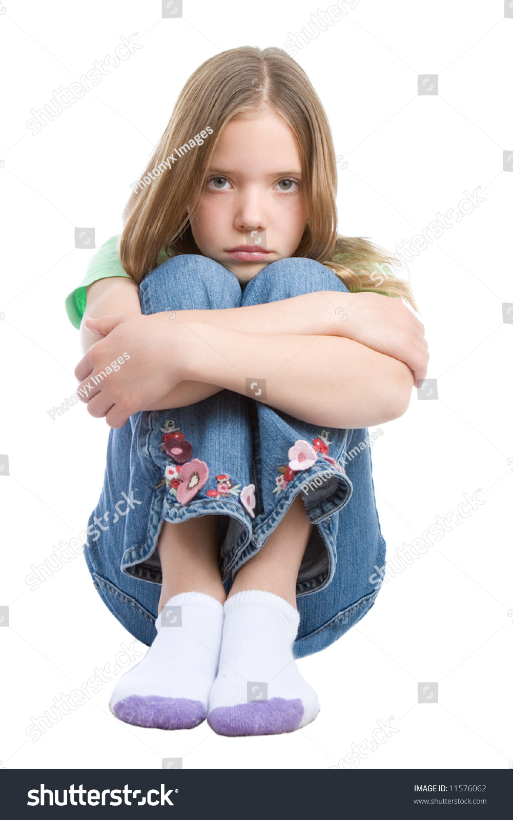 Portrait Of Beautiful Young Girl Sitting And Looking In The Camera ...