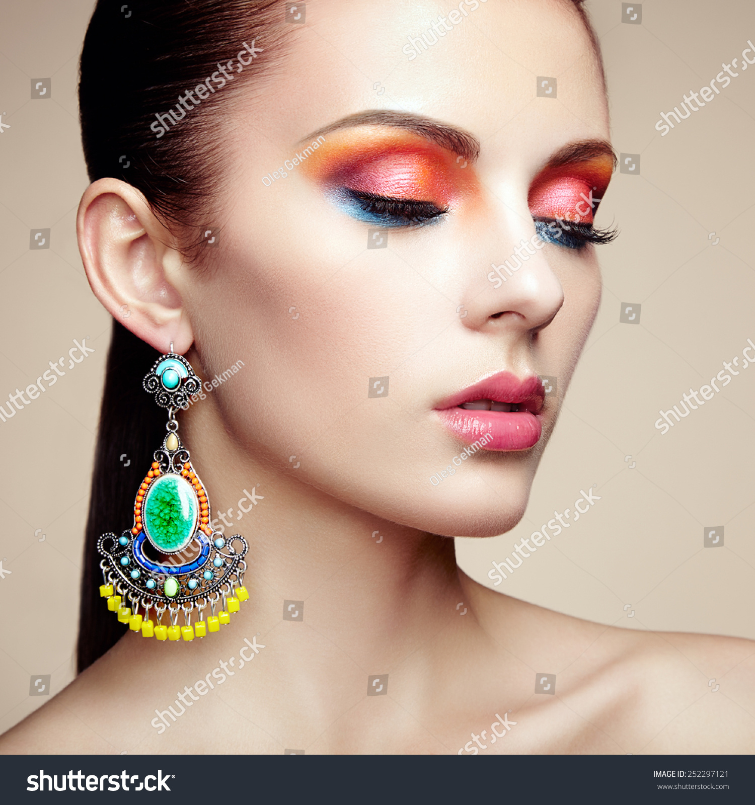 Portrait Of Beautiful Young Woman With Earring. Jewelry And Accessories ...