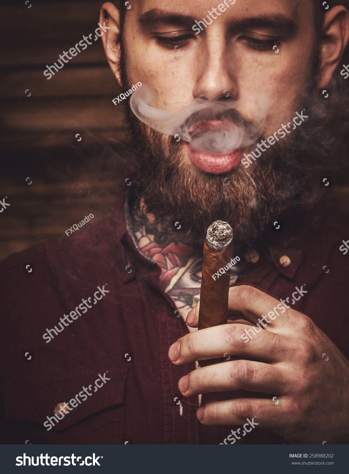 Portrait Of Brutal Tattooed Male Smoking Cigar Stock Photo 258988202 ...