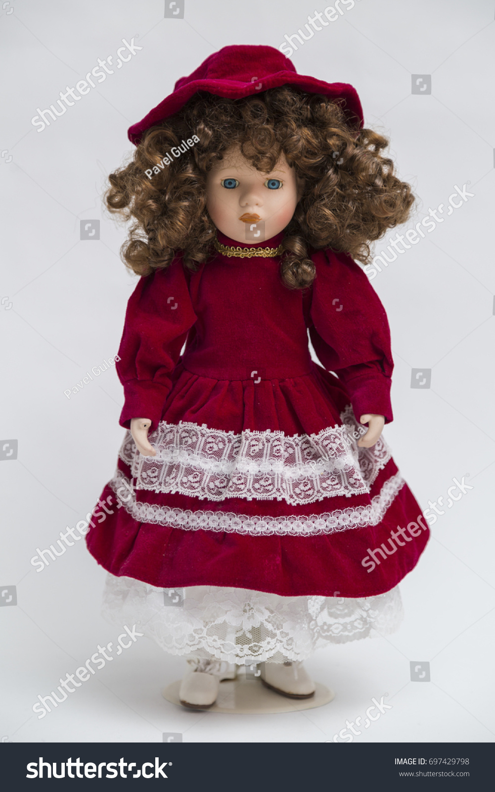 old doll with red hair