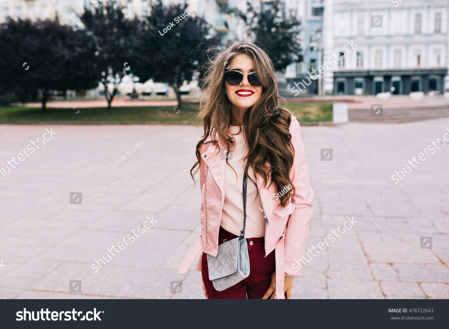 SEARCH AND BUY THIS PRODUCT Portrait Cute Girl Long Curly Hair Stock Photo 478722643