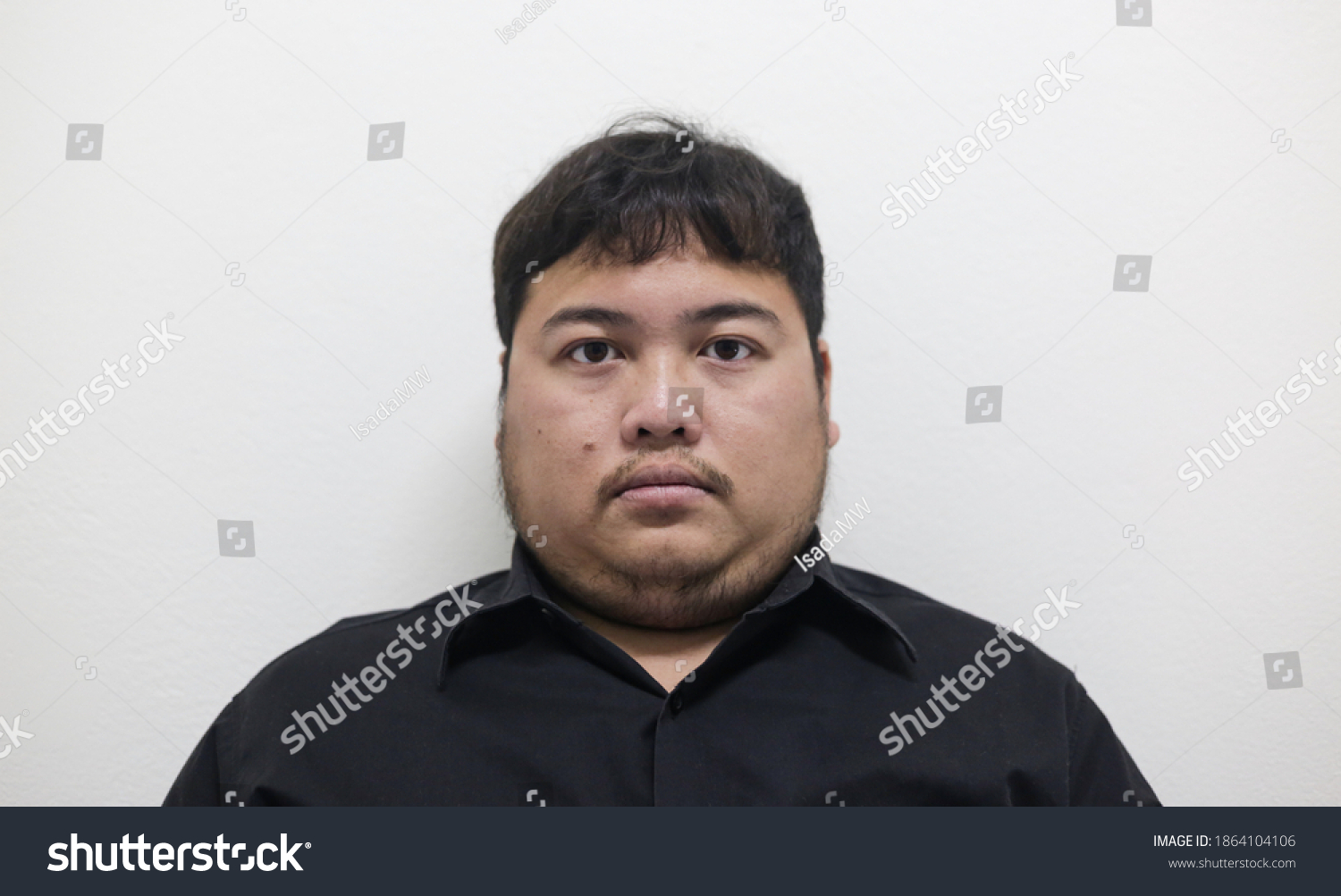 portrait-fat-man-black-shirt-stock-photo-1864104106-shutterstock