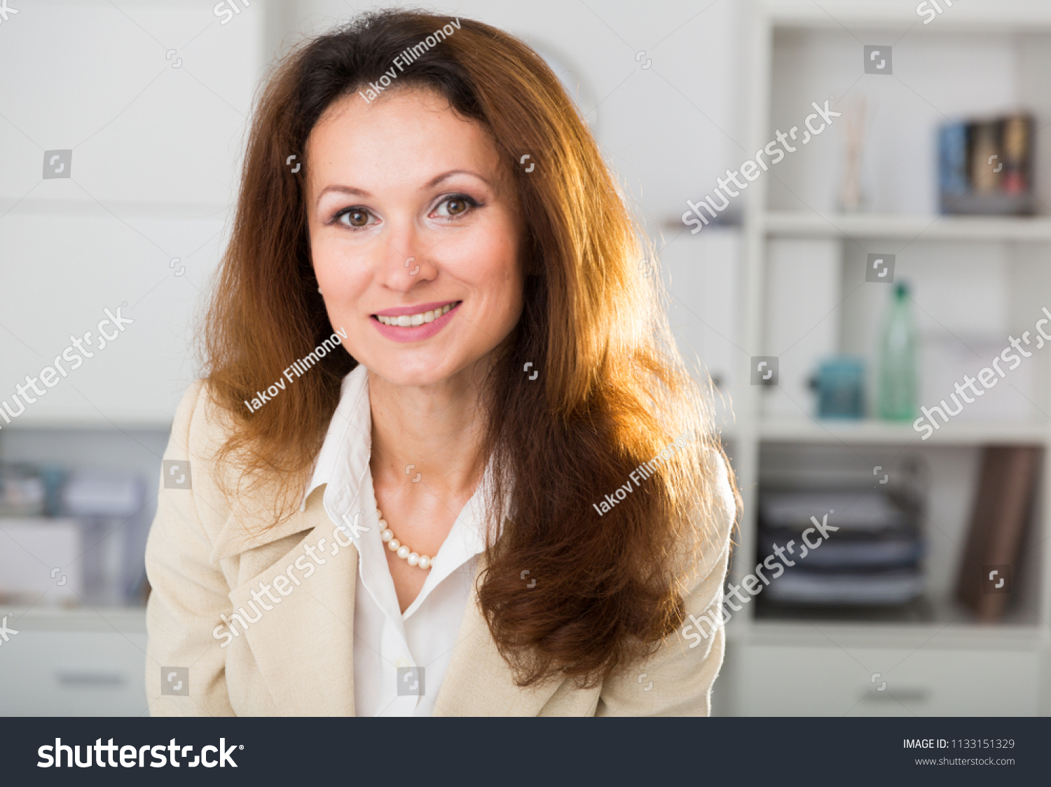 portrait-female-manager-which-working-office-stock-photo-edit-now