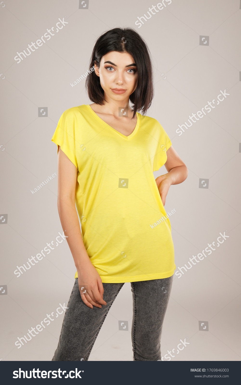 portrait-girl-grey-pants-yellow-tshirt-stock-photo-1769846003