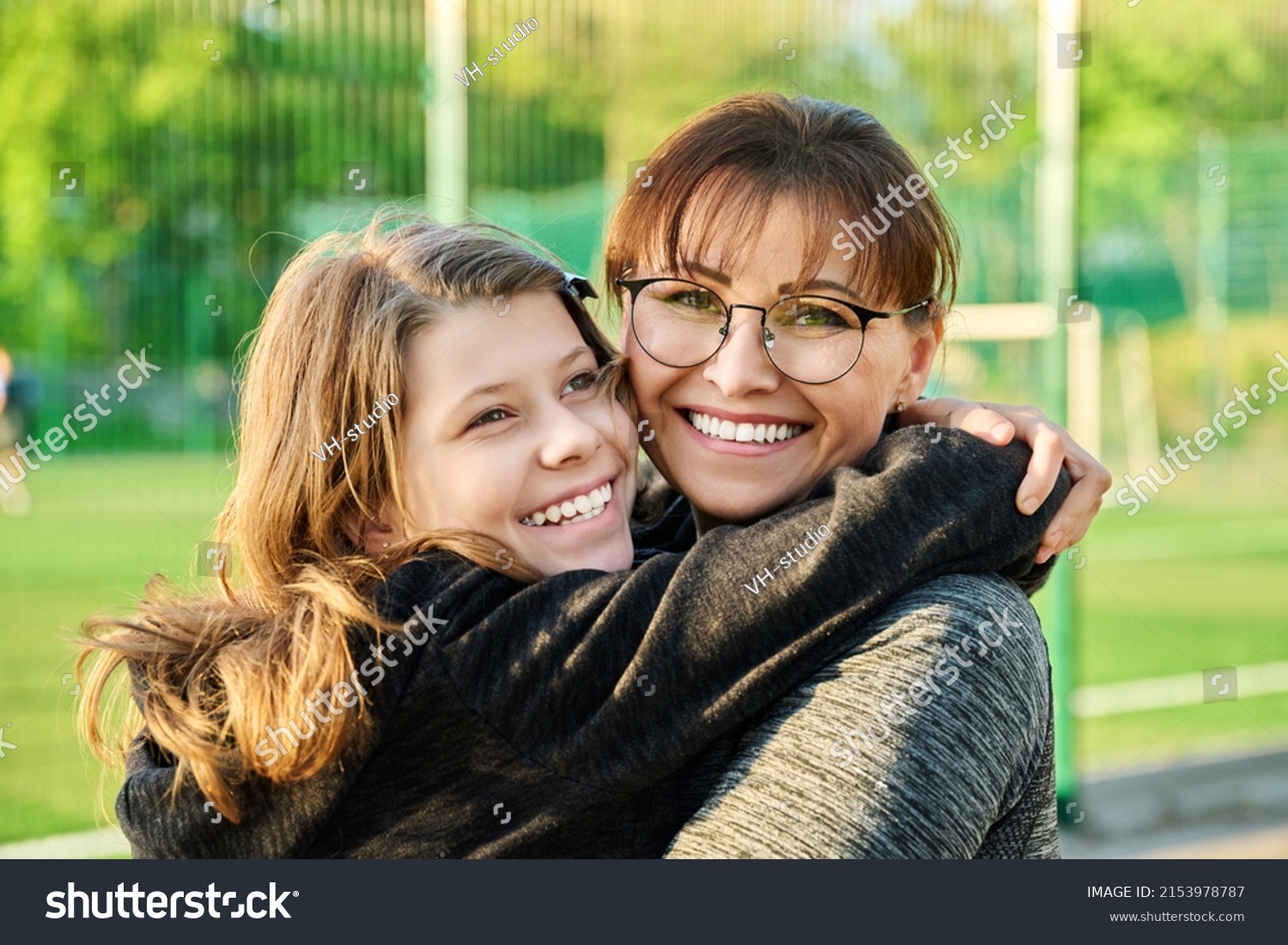 Portrait Happy Mom Preteen Daughter Hugging Stock Photo 2153978787 ...