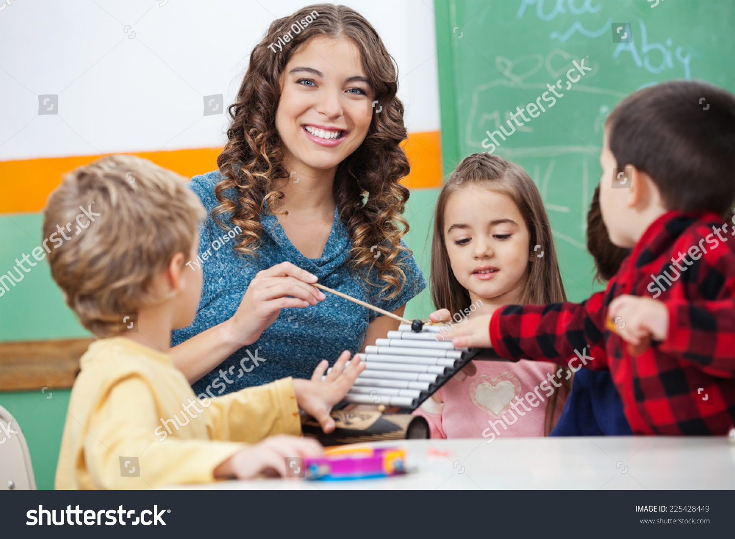Portrait Happy Preschool Teacher Children Playing Stock Photo (Edit Now