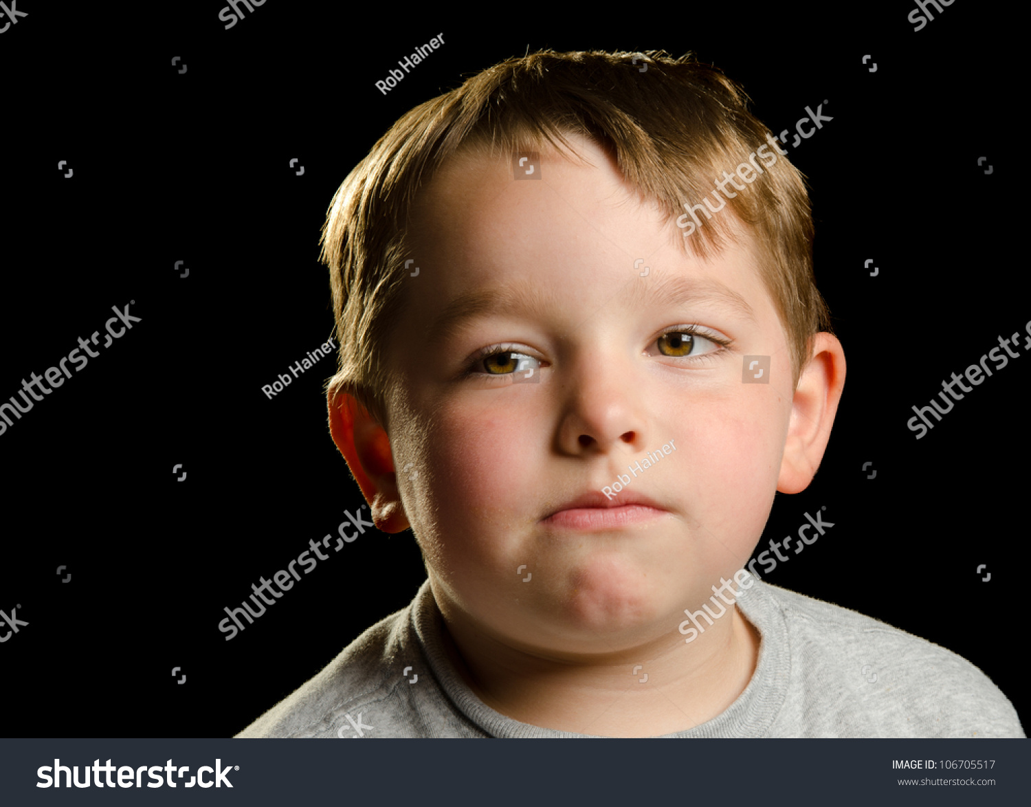 Portrait Of Serious, Sad, Angry Or Depressed Child Isolated On Black ...