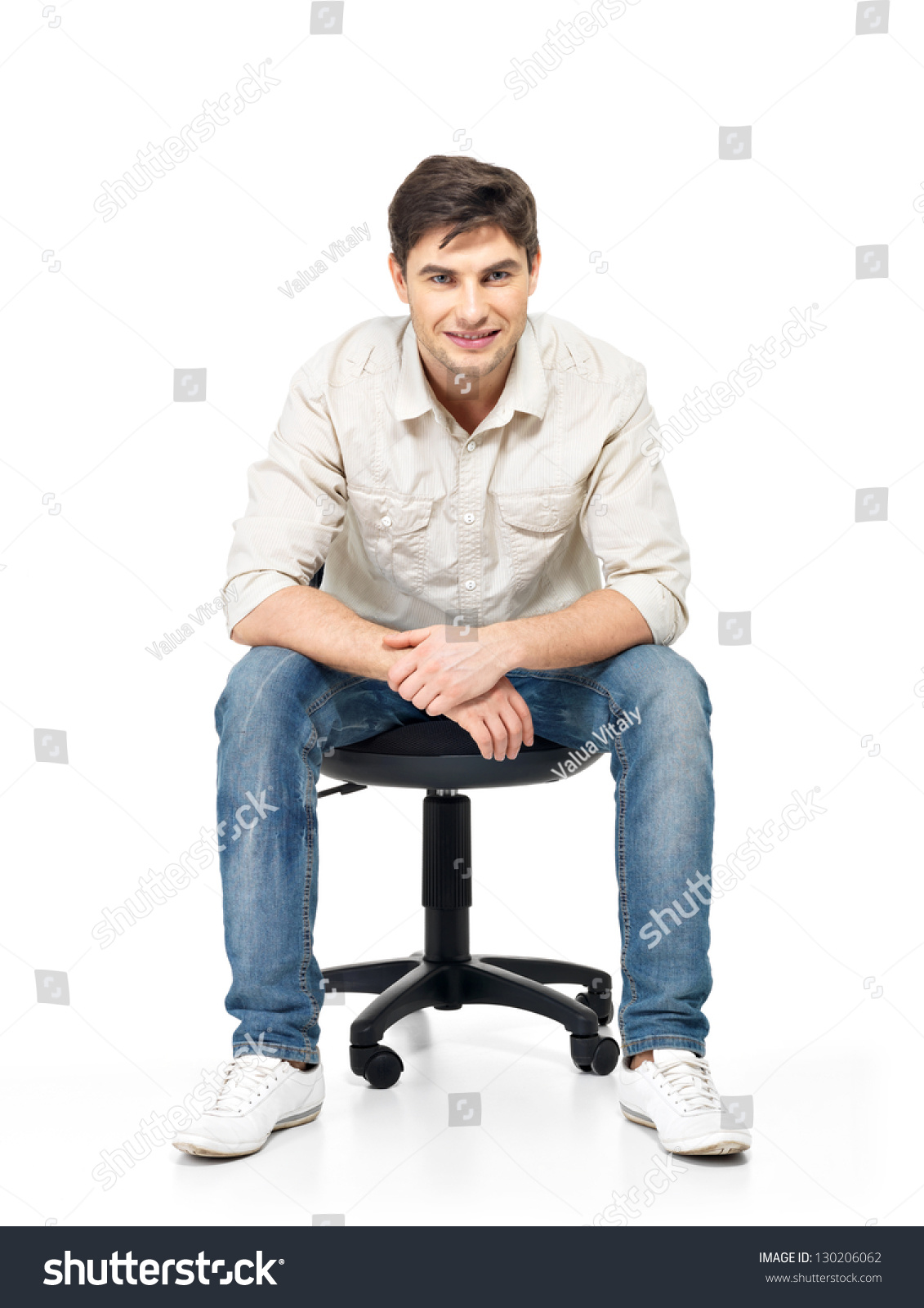 Portrait Of Smiling Happy Man Sits On The Office Chair Isolated On ...
