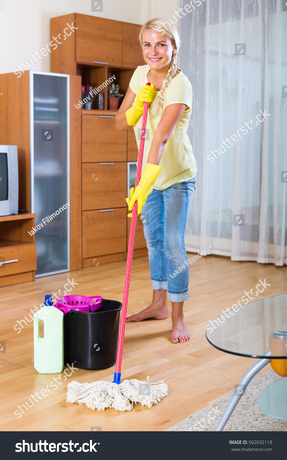 Portrait Smiling Spanish Girl Cleaning Floor Stock Photo Edit Now