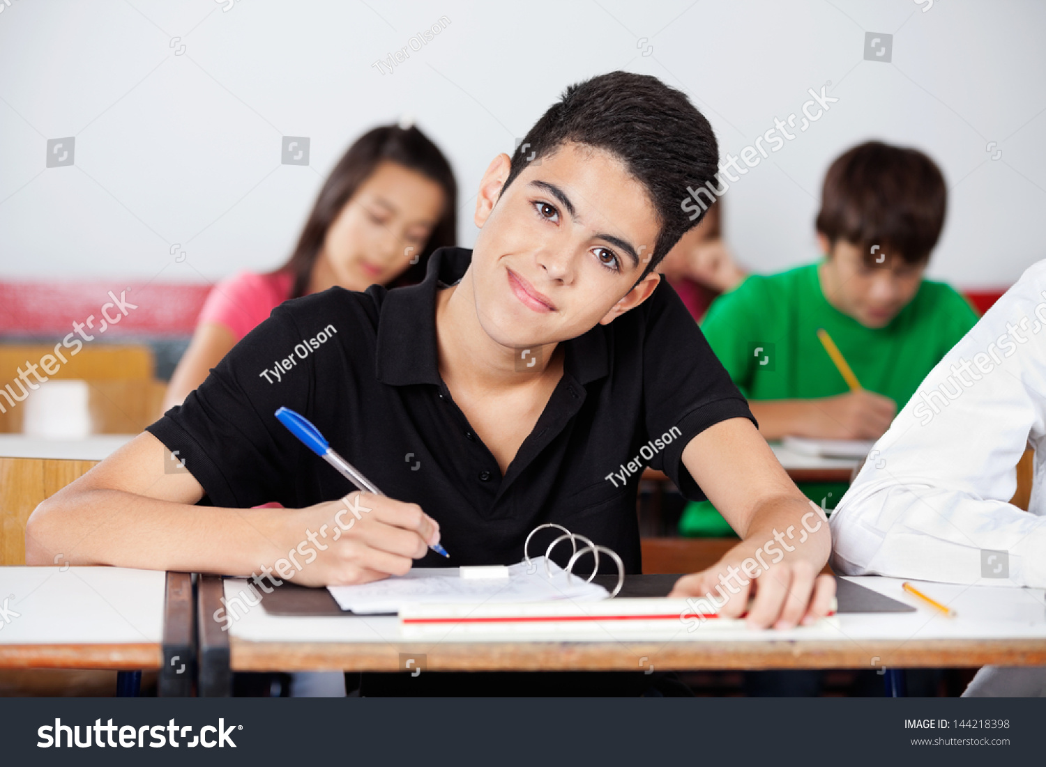 Portrait Teenage Boy Writing Desk Classmates Stock Photo 144218398 