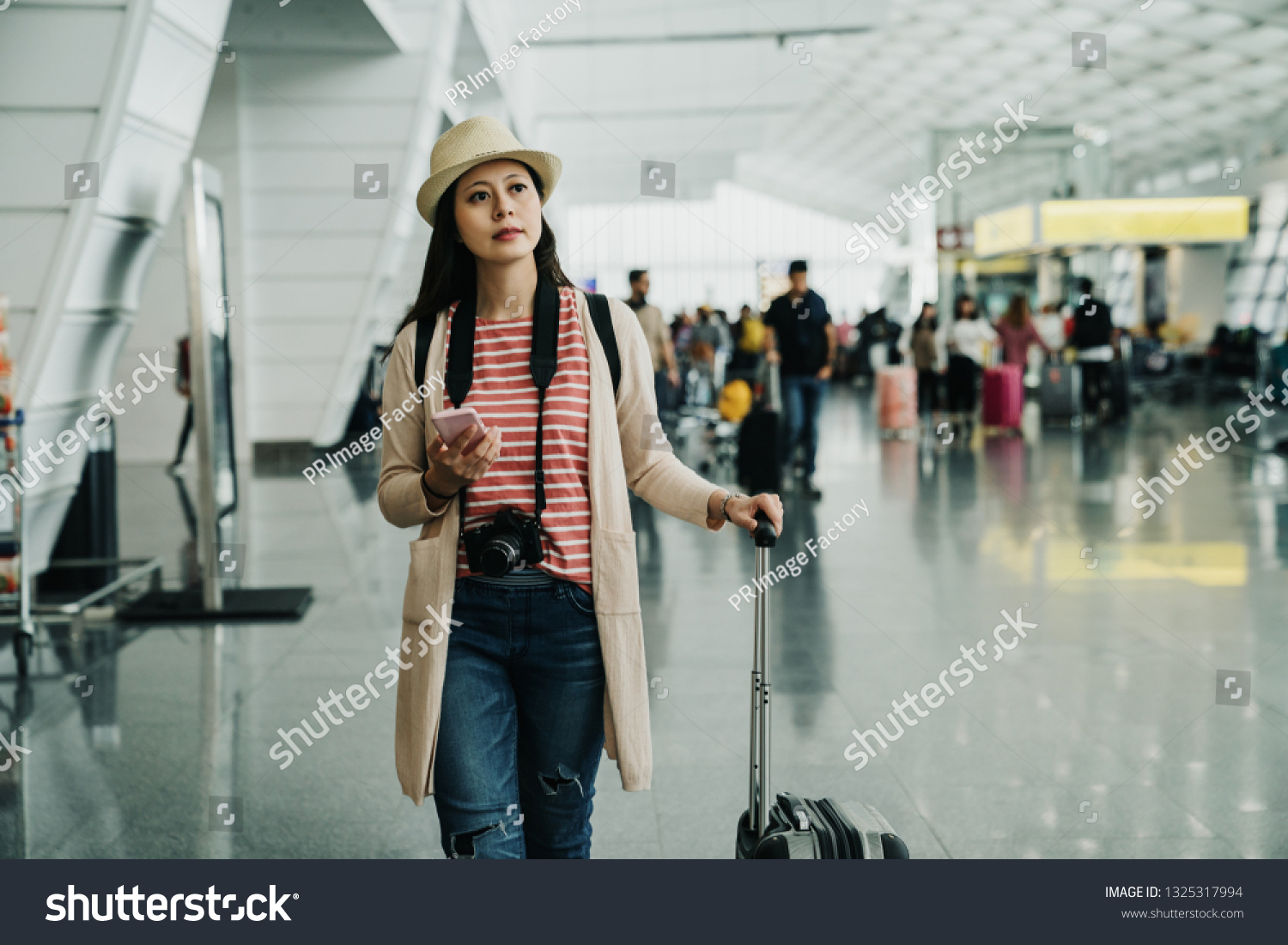 asian girl carrying suitcase pics