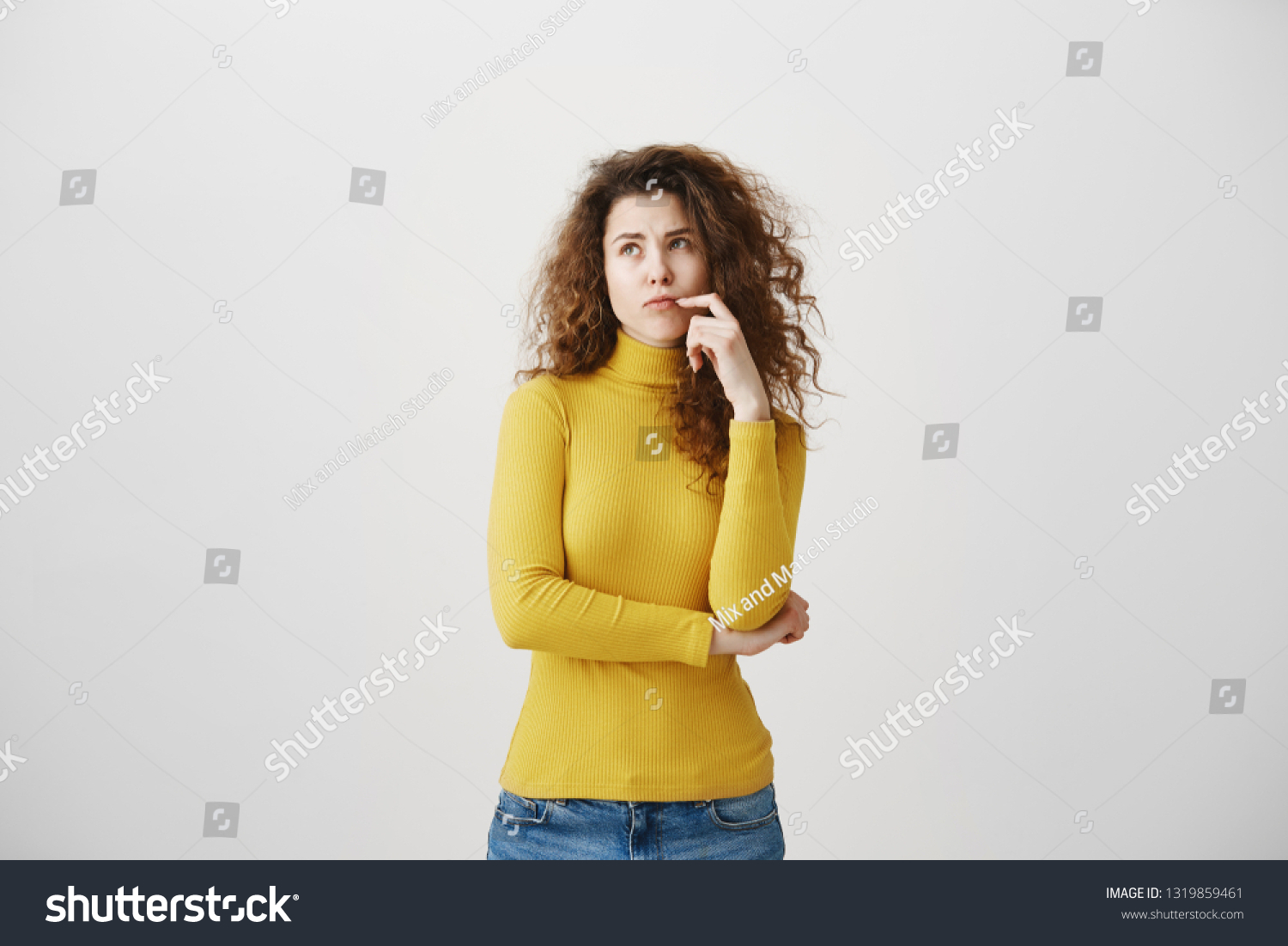 portrait-young-tricky-woman-touching-lock-stock-photo-1319859461