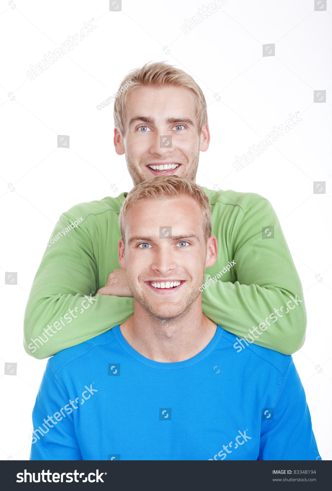 Portrait Of Young Twin Brothers With Blond Hair And Blue Eyes ...