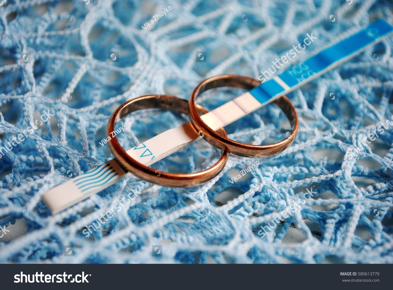 Positive Pregnancy Test Wedding Rings Stock Photo Edit Now 580613779