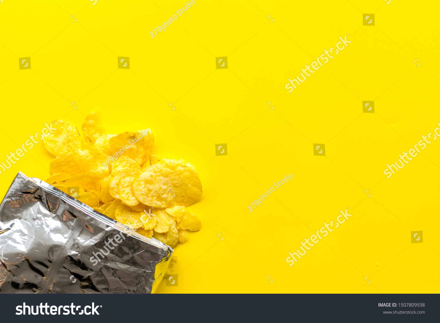 Download Potato Crisps Bag On Yellow Background Stock Photo Edit Now 1507809938 Yellowimages Mockups