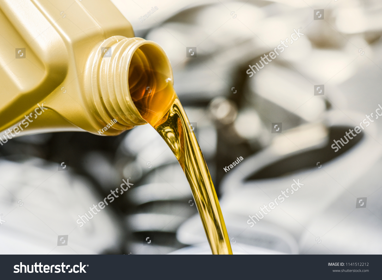 Download Pour Yellow Motor Oil Into Car Sports Recreation Stock Image 1141512212 PSD Mockup Templates