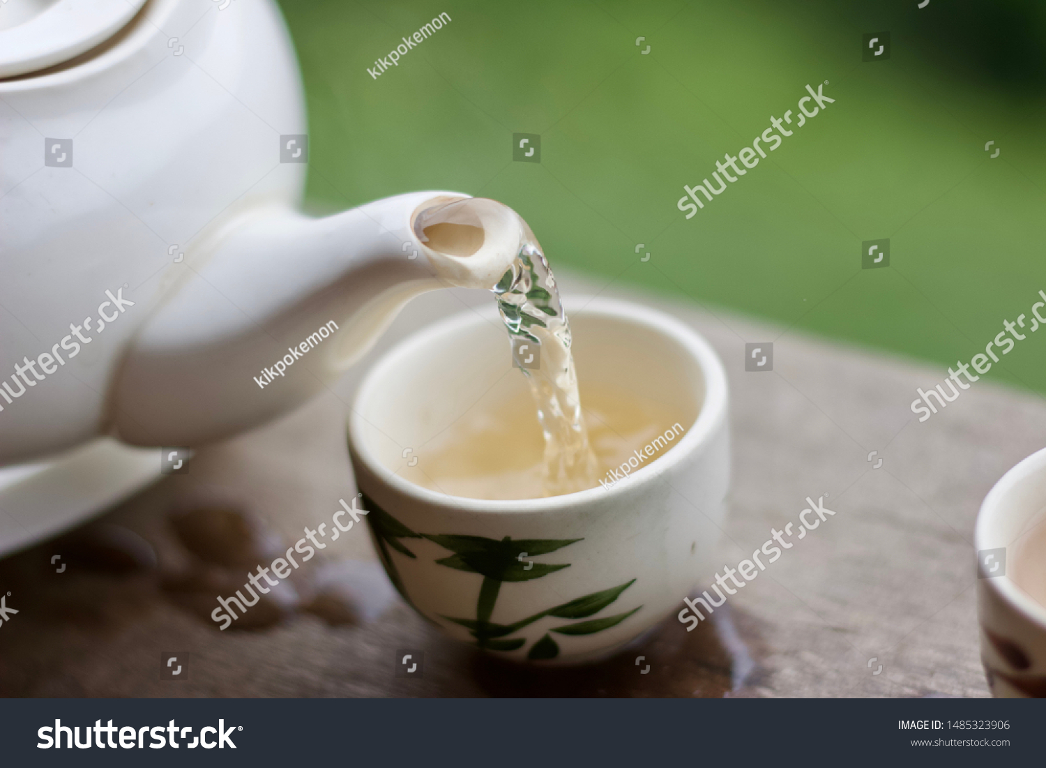 Hot Tea Pitcher In Dining Room