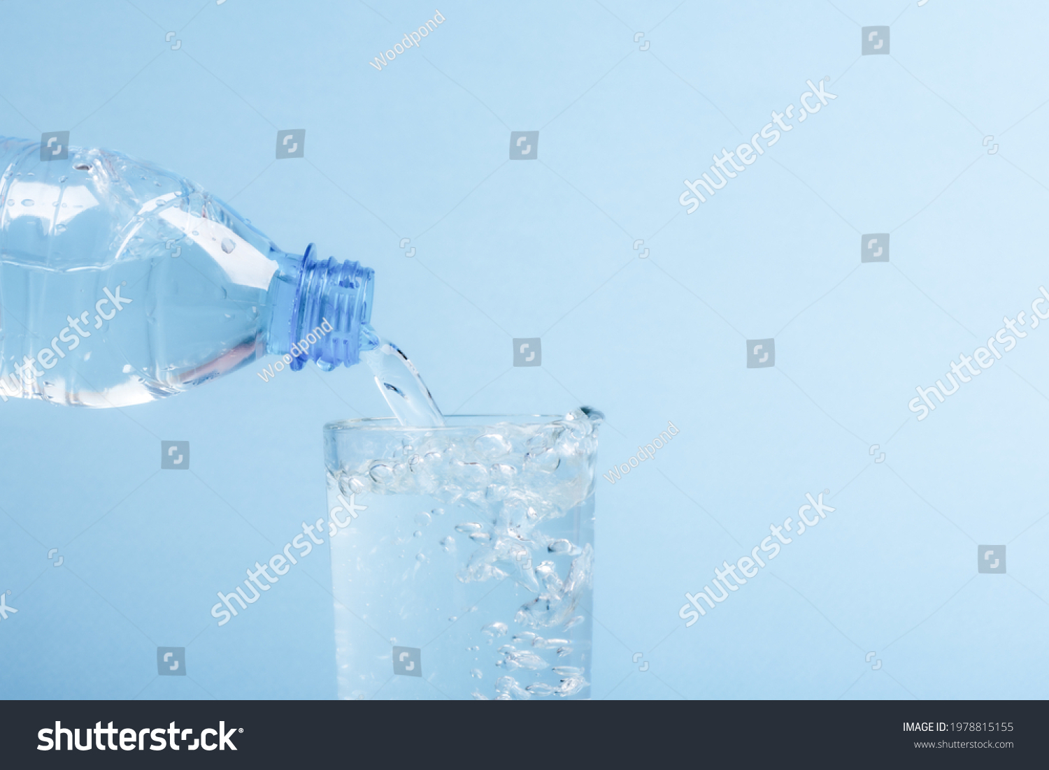 Pouring Water Plastic Bottle Into Glass Stock Photo 1978815155 ...