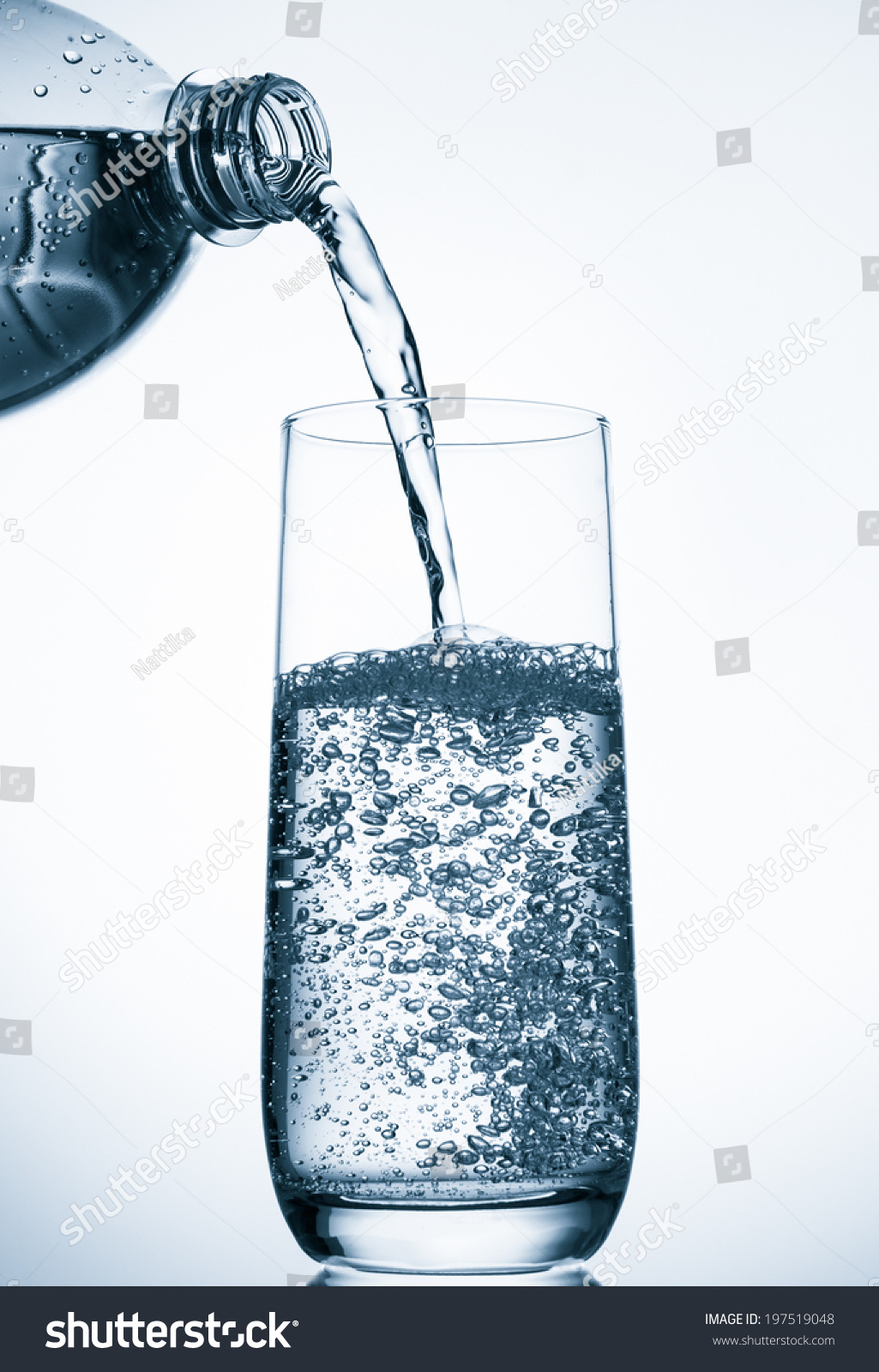 Pouring Water Into Glass Bottle On Stock Photo 197519048 | Shutterstock