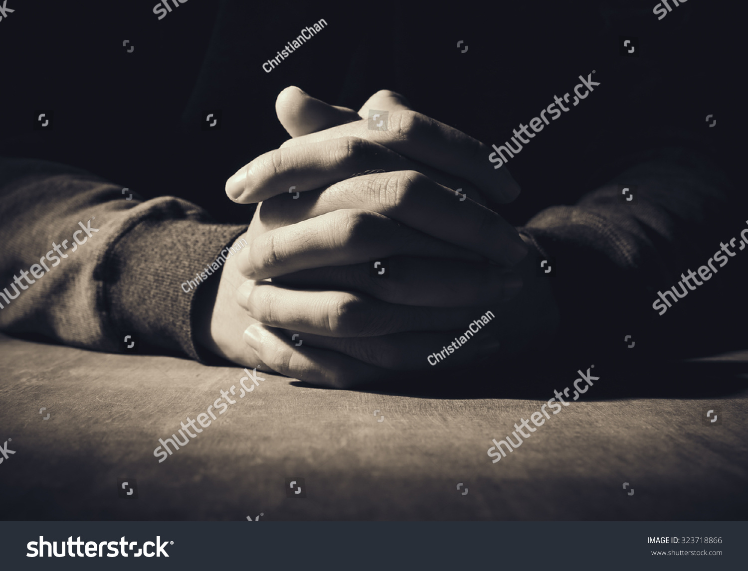 188 Praying hands clasped at desk Images, Stock Photos & Vectors ...