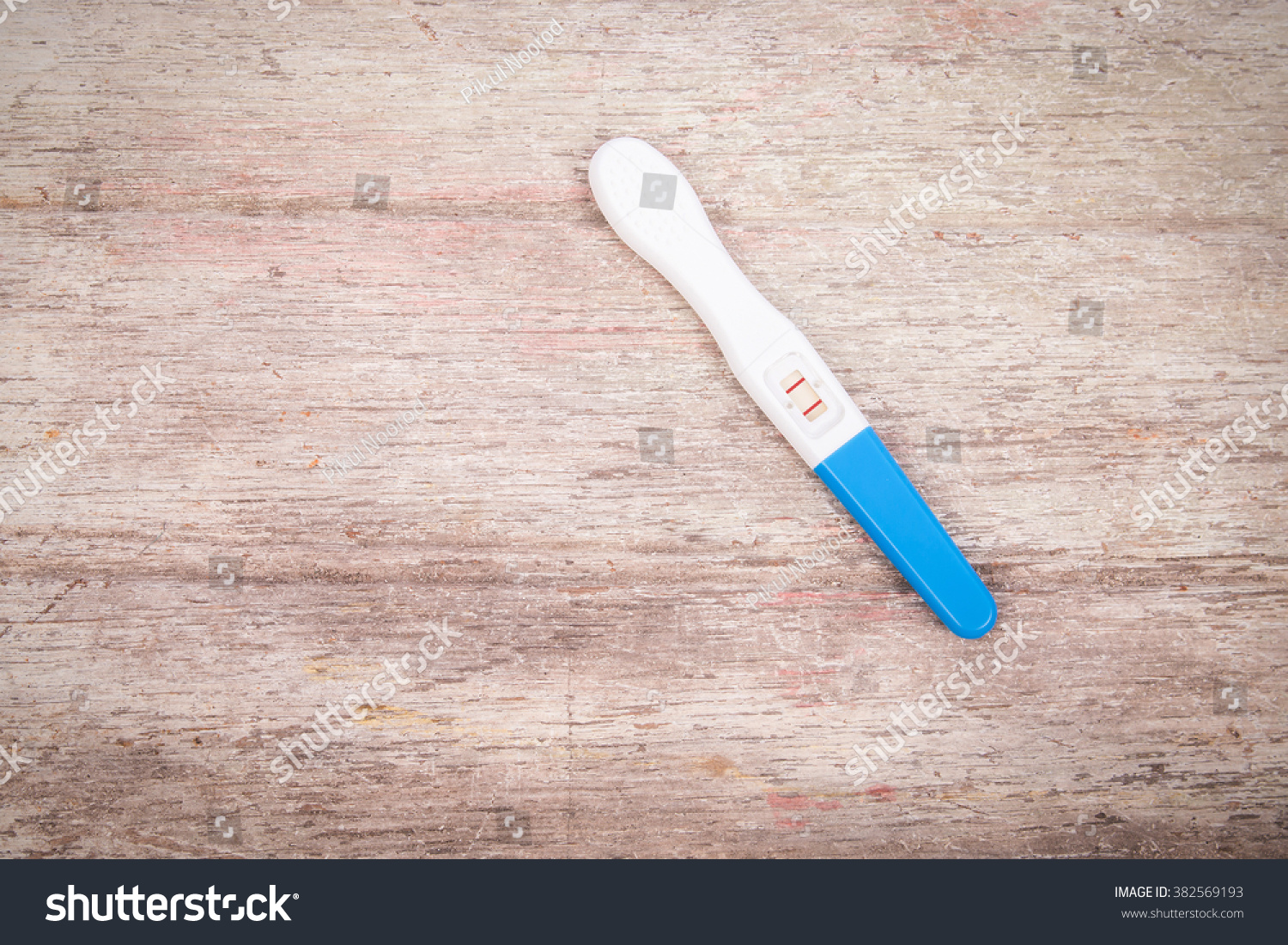 Pregnancy Test On Wooden Background Stock Photo 382569193 : Shutterstock