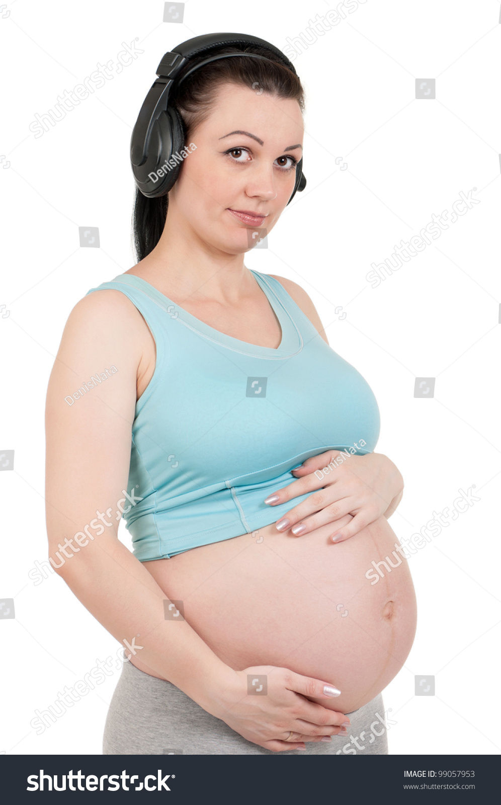 Pregnant Belly Headphones Isolated Over White Stock Photo 99057953